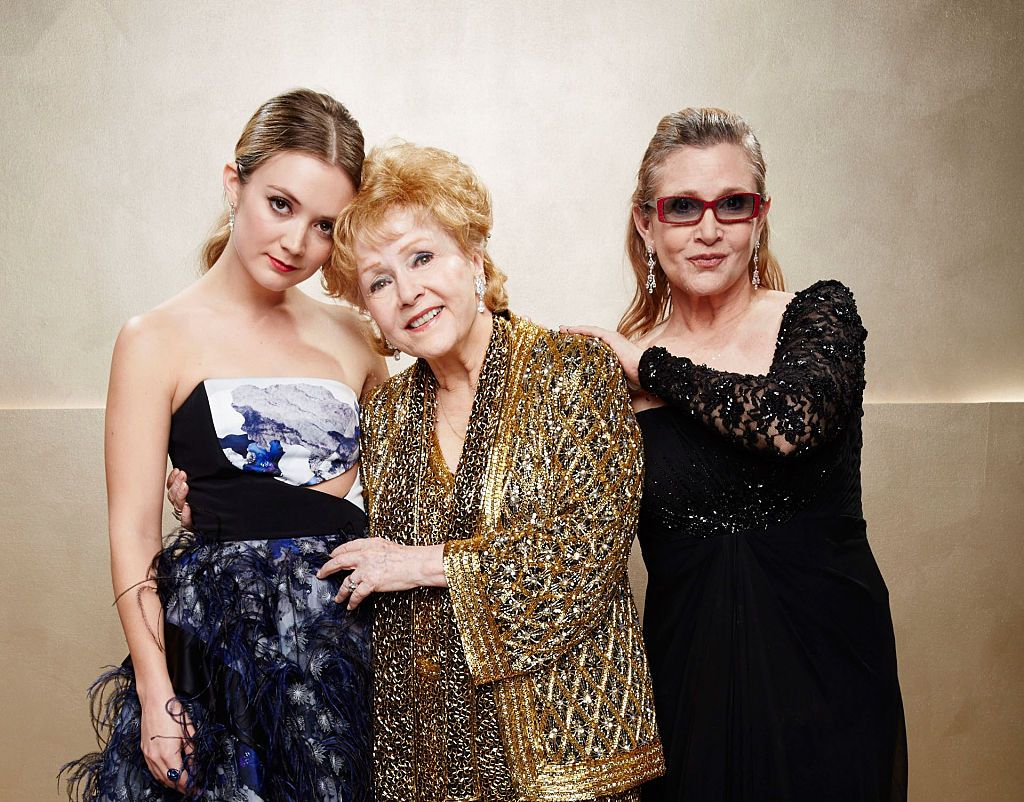 Billie Lourd, Carrie Fisher and Debbie Reynolds pose during TNT's 21st Annual Screen Actors Guild Awards at The Shrine Auditorium on January 25, 2015 in Los Angeles, California. | Source: Getty Images