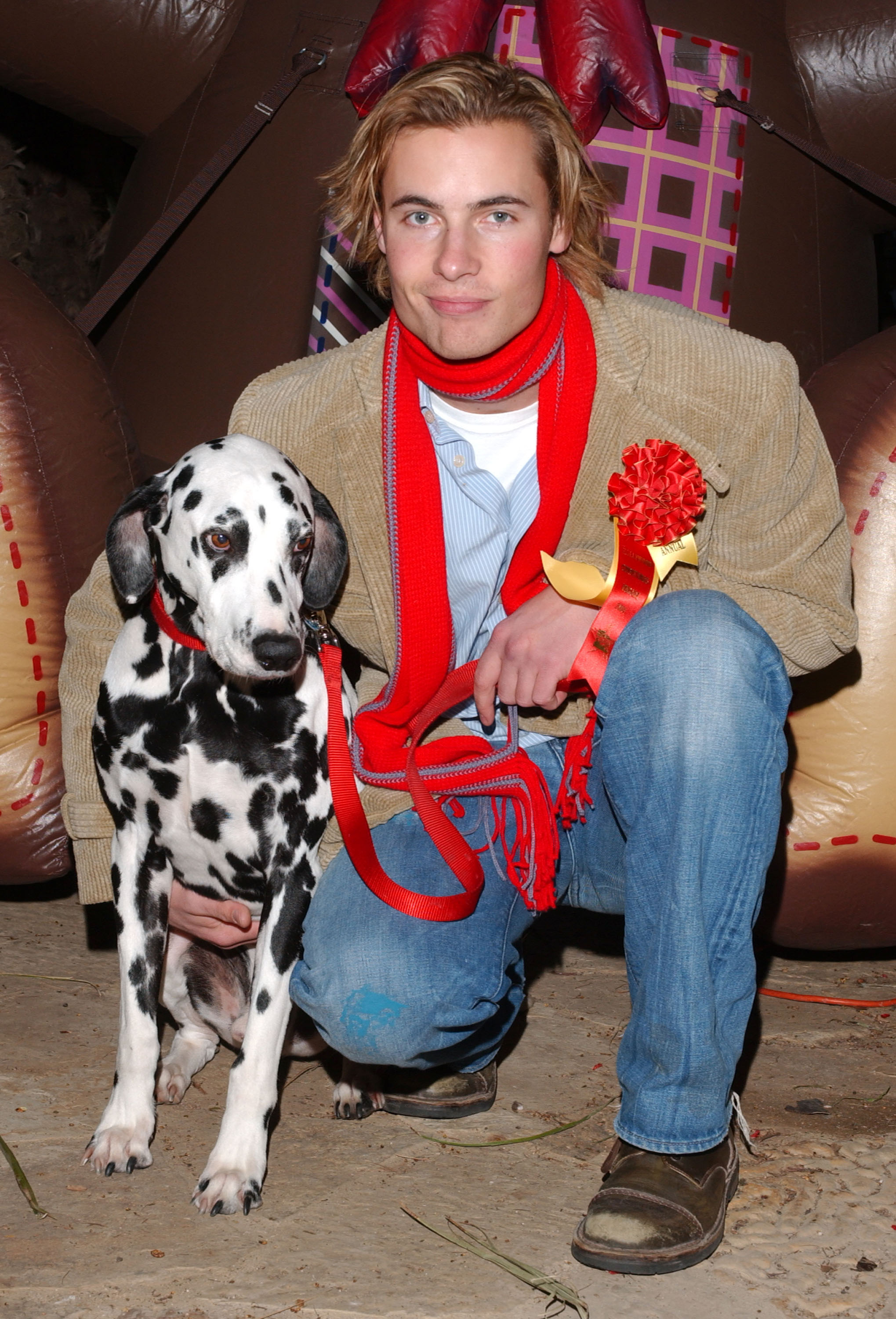 The actor poses during The 73rd Annual Hollywood Christmas Parade, on August 8, 2011 | Source: Getty Images