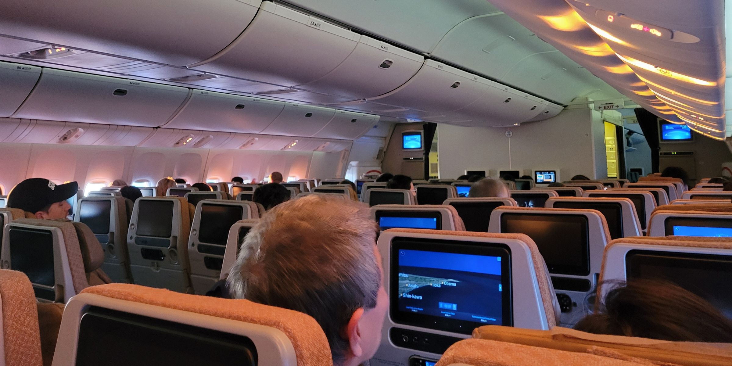 Travelers inside a plane | Source: Shutterstock