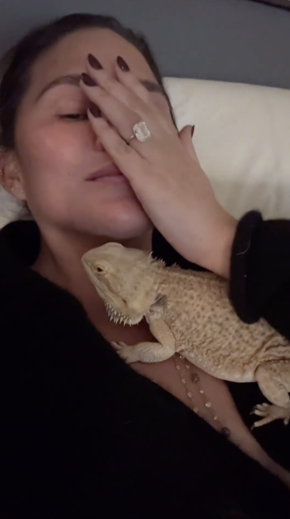 Chrissy Teigen's Instagram Story featuring her ring and her pet bearded dragon | Source: Instagram/chrissyteigen