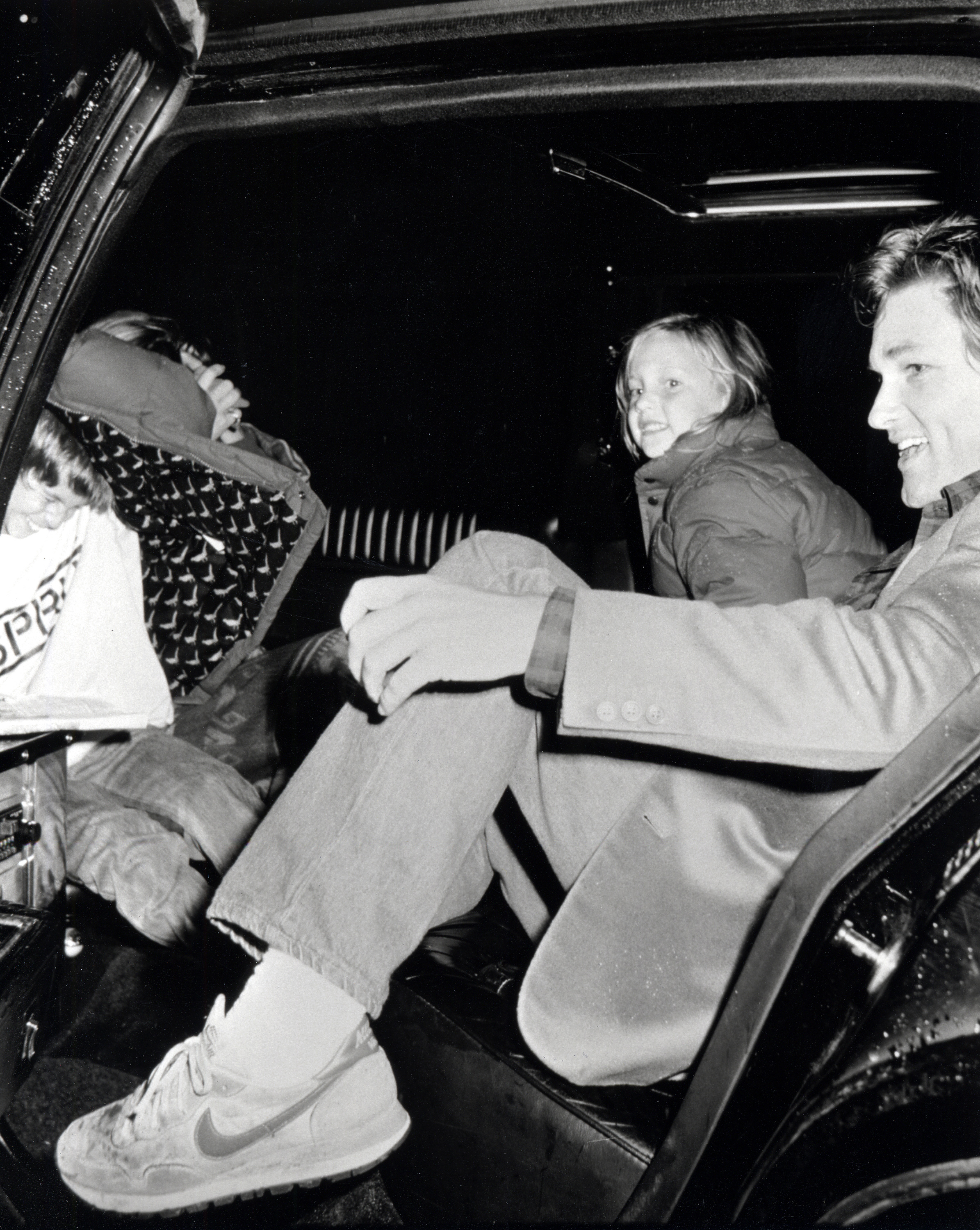 Kurt Russell and kids at the FAO Schwarz Toy Store Opening Gala in New York, 1986 | Source: Getty Images