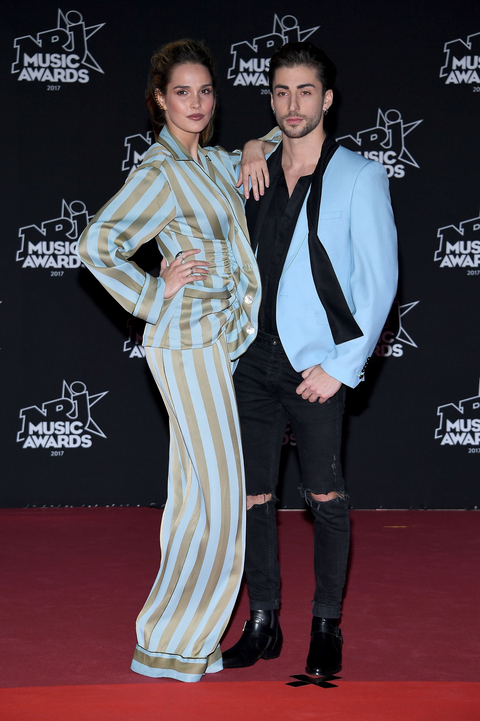 Camille Lou et Gabriele Beddoni participent aux 19e NRJ Music Awards le 4 novembre 2017 à Cannes, France. | Photo : Getty Images