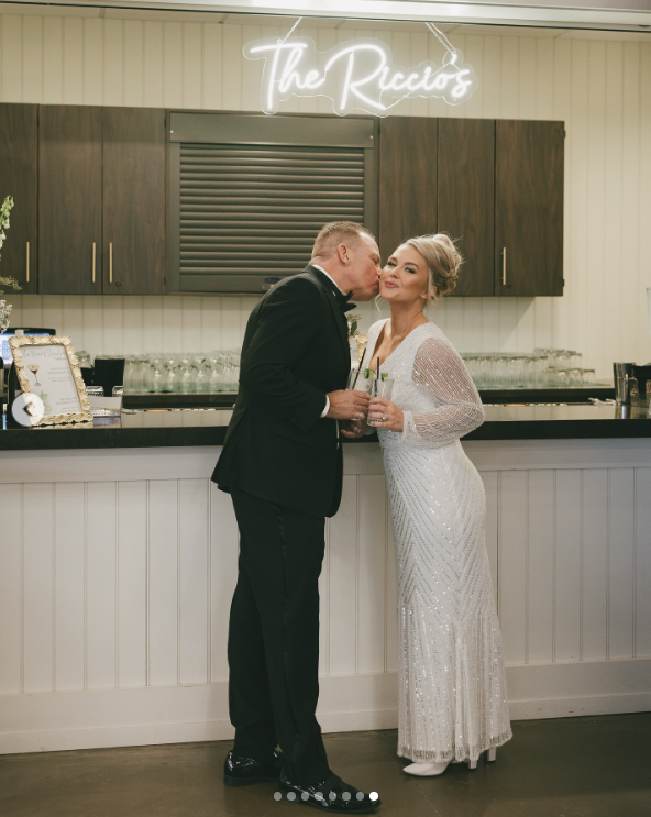 Nicholas Riccio kissing his wife on the cheek | Source: Instagram/karolineleavitt