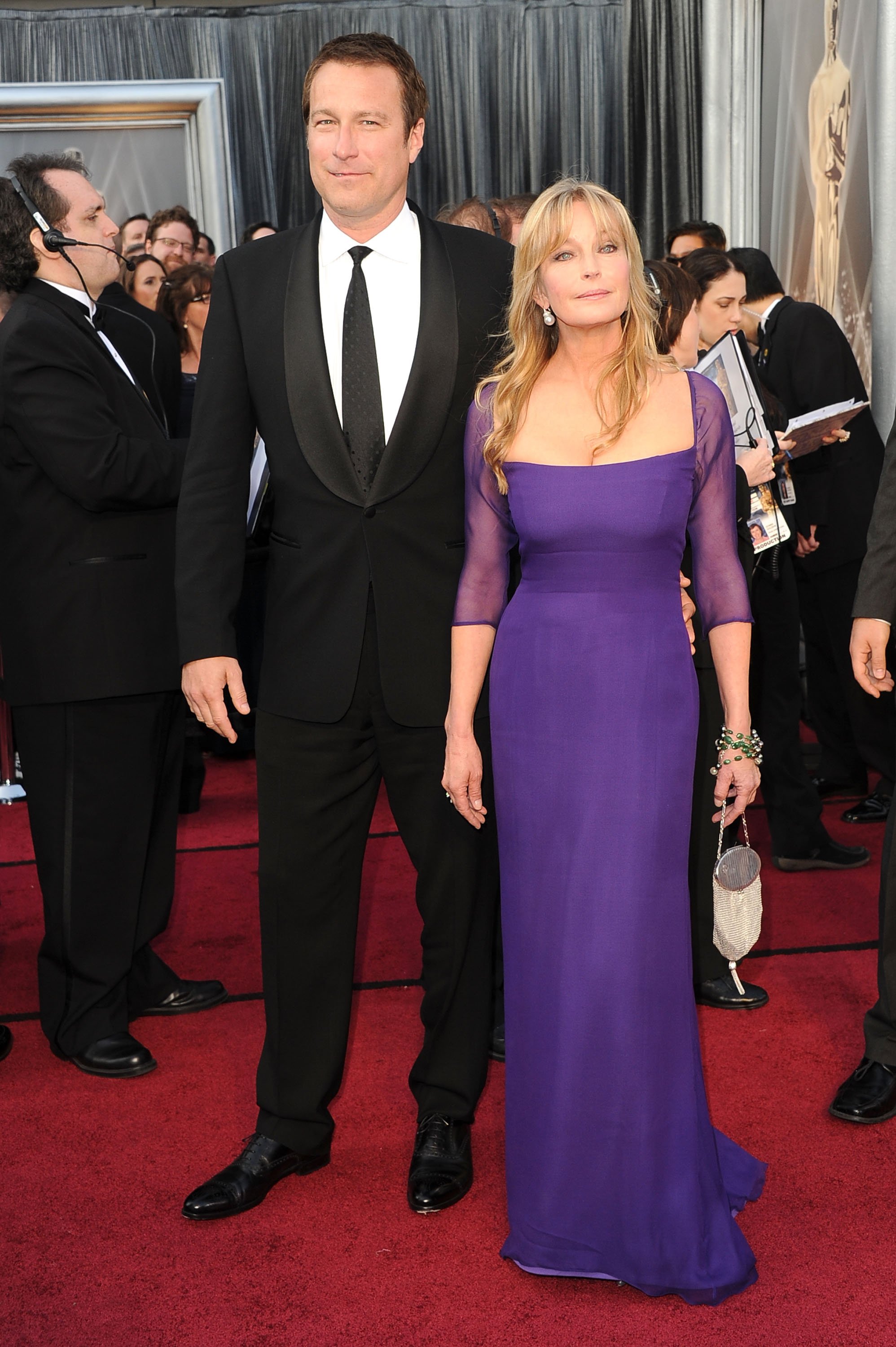  Actor John Corbett and actress Bo Derek arrive at the 84th Annual Academy Awards held at the Hollywood & Highland Center on February 26, 2012 in Hollywood, California | Source: Getty Images