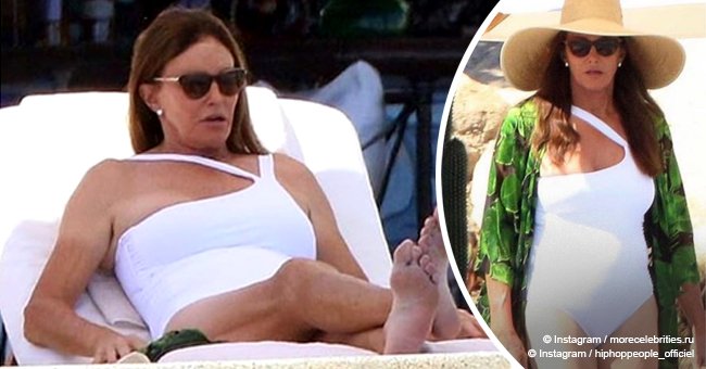 Caitlyn Jenner shows off her bare legs in a white swimsuit while celebrating her 69th birthday