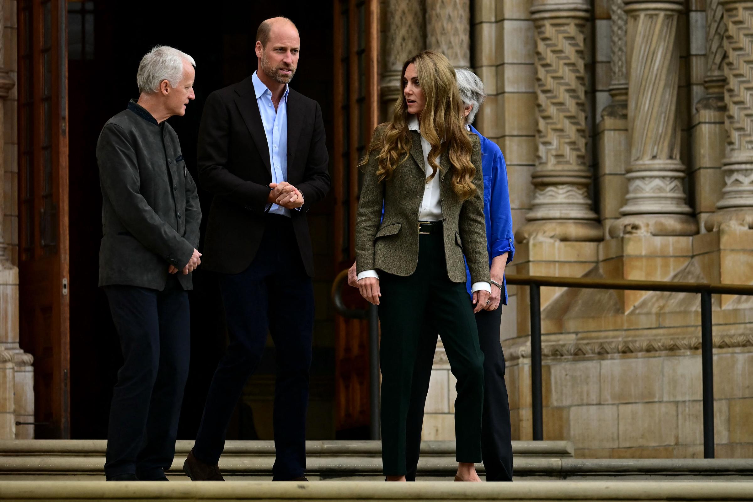 Arriving at the museum's newly transformed gardens in London, Princess Catherine is pictured beside Prince William. Her golden-toned waves frame her face, drawing attention to her lighter hair color amid the visit's environmental focus.