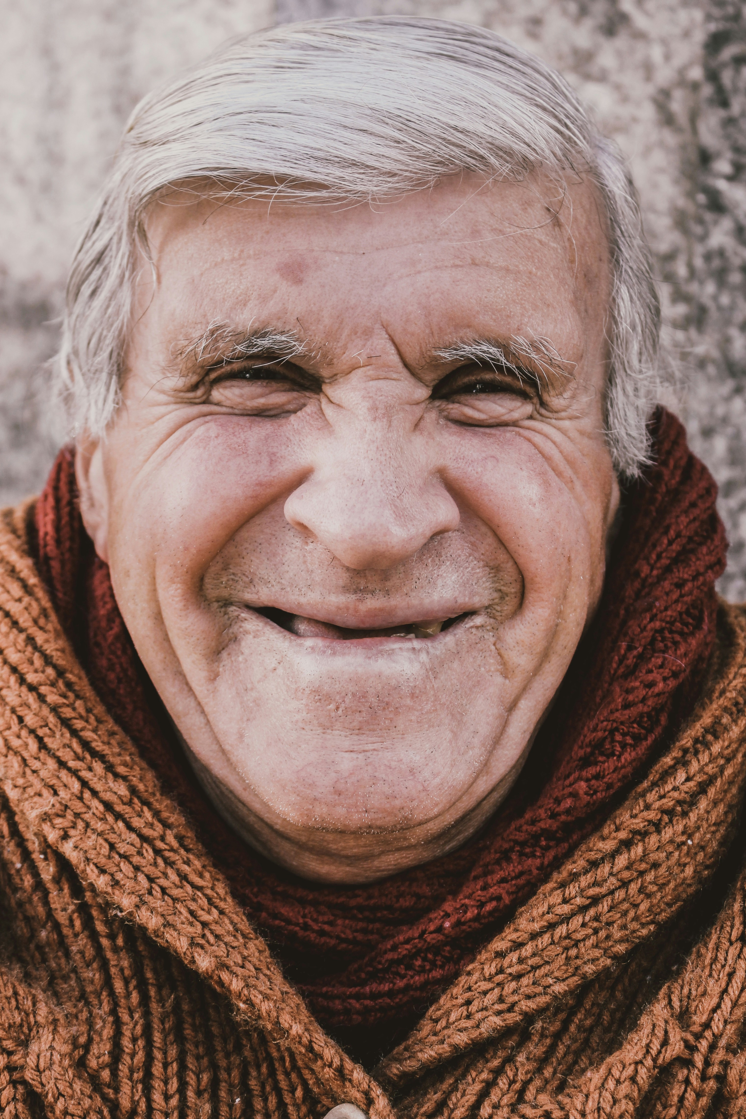 A close-up of a happy man | Source: Unsplash