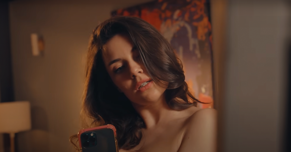Woman taking a selfie | Source: YouTube / DramatizeMe