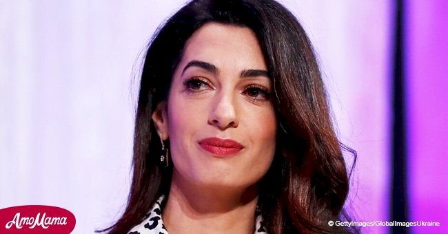 Amal Clooney appears in an eye-catching polka dot dress after business meetings in New York