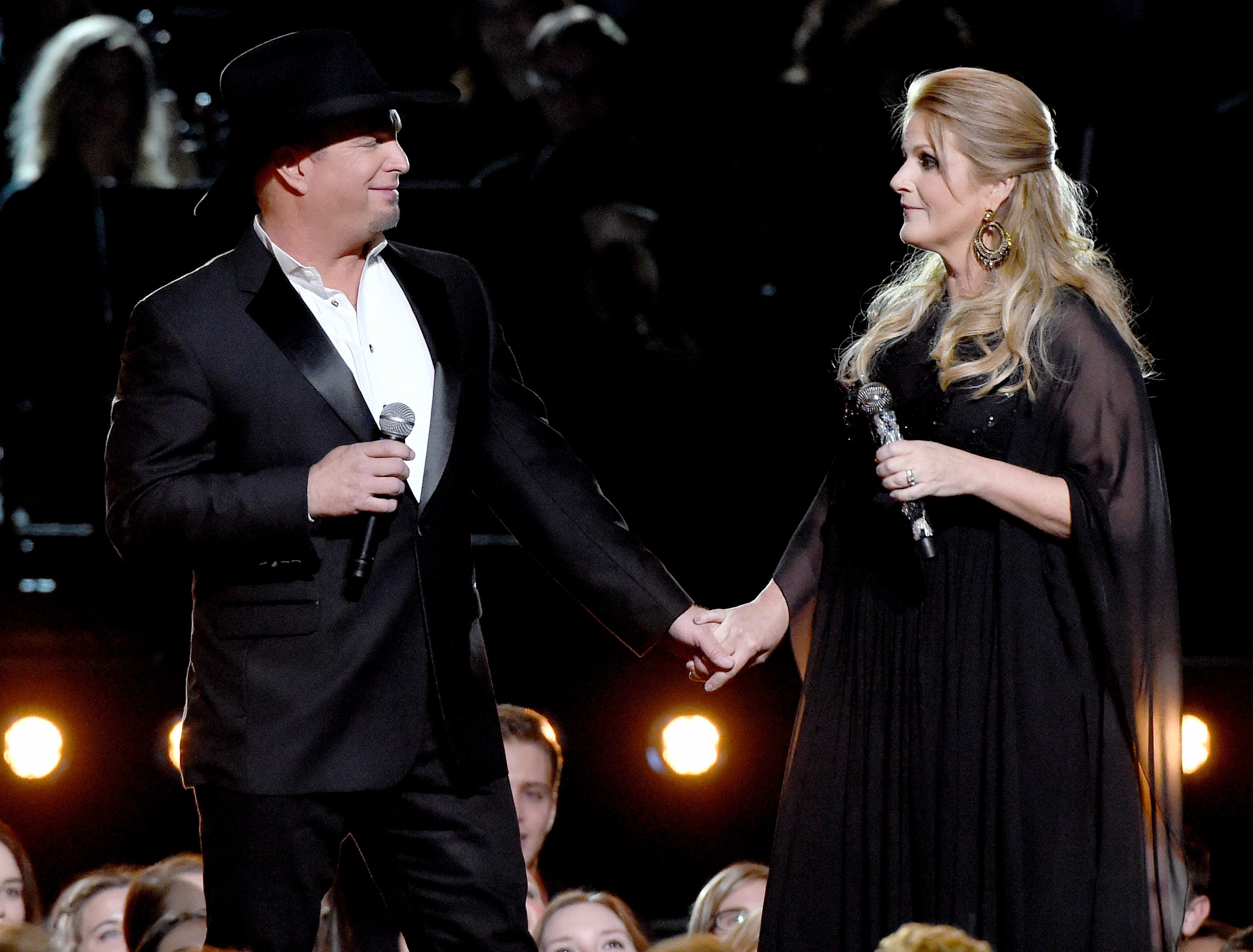 Garth Brooks and Trisha Yearwood perform onstage at the 50th annual CMA Awards at the Bridgestone Arena on November 2, 2016 in Nashville, Tennessee | Source: Getty Images