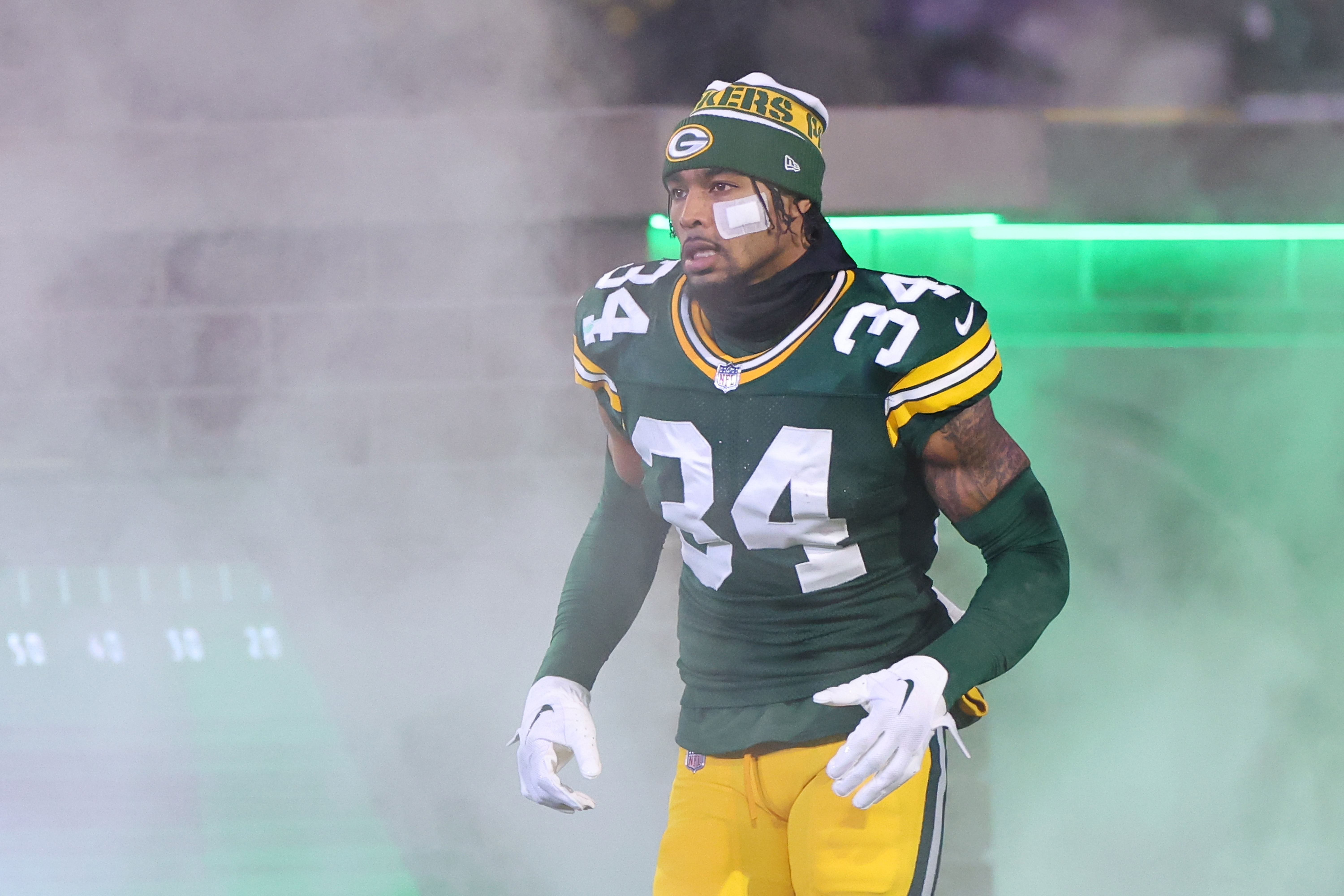 onathan Owens #34 of the Green Bay Packers takes the field for player introductions prior to a game against the Kansas City Chiefs at Lambeau Field on December 03, 2023, in Green Bay, Wisconsin. | Source: Getty Images