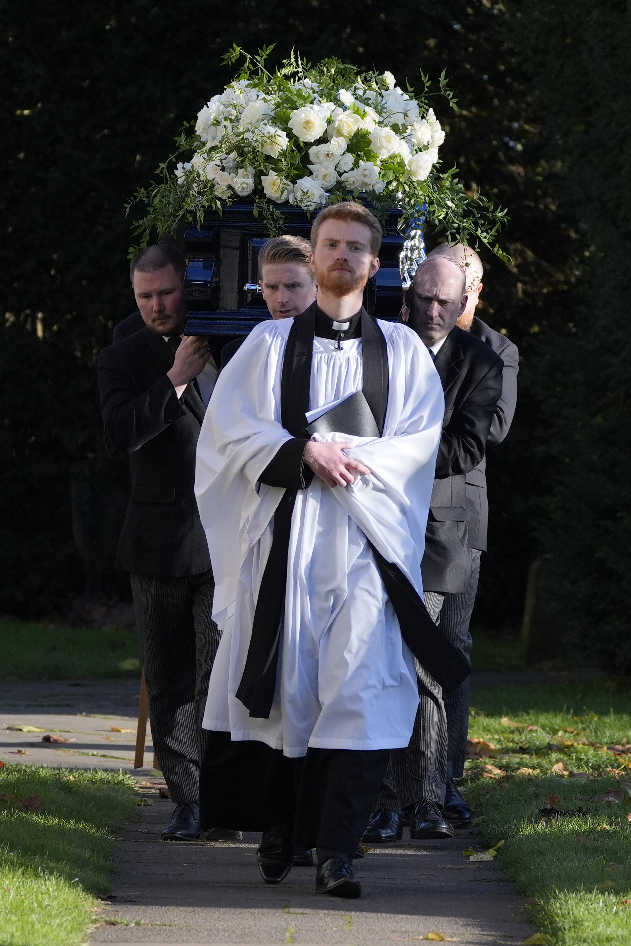 Liam Payne's coffin carried by pallbearers after the funeral service at St Mary's Church on November 20, 2024, in Amersham, England. | Source: Getty Images