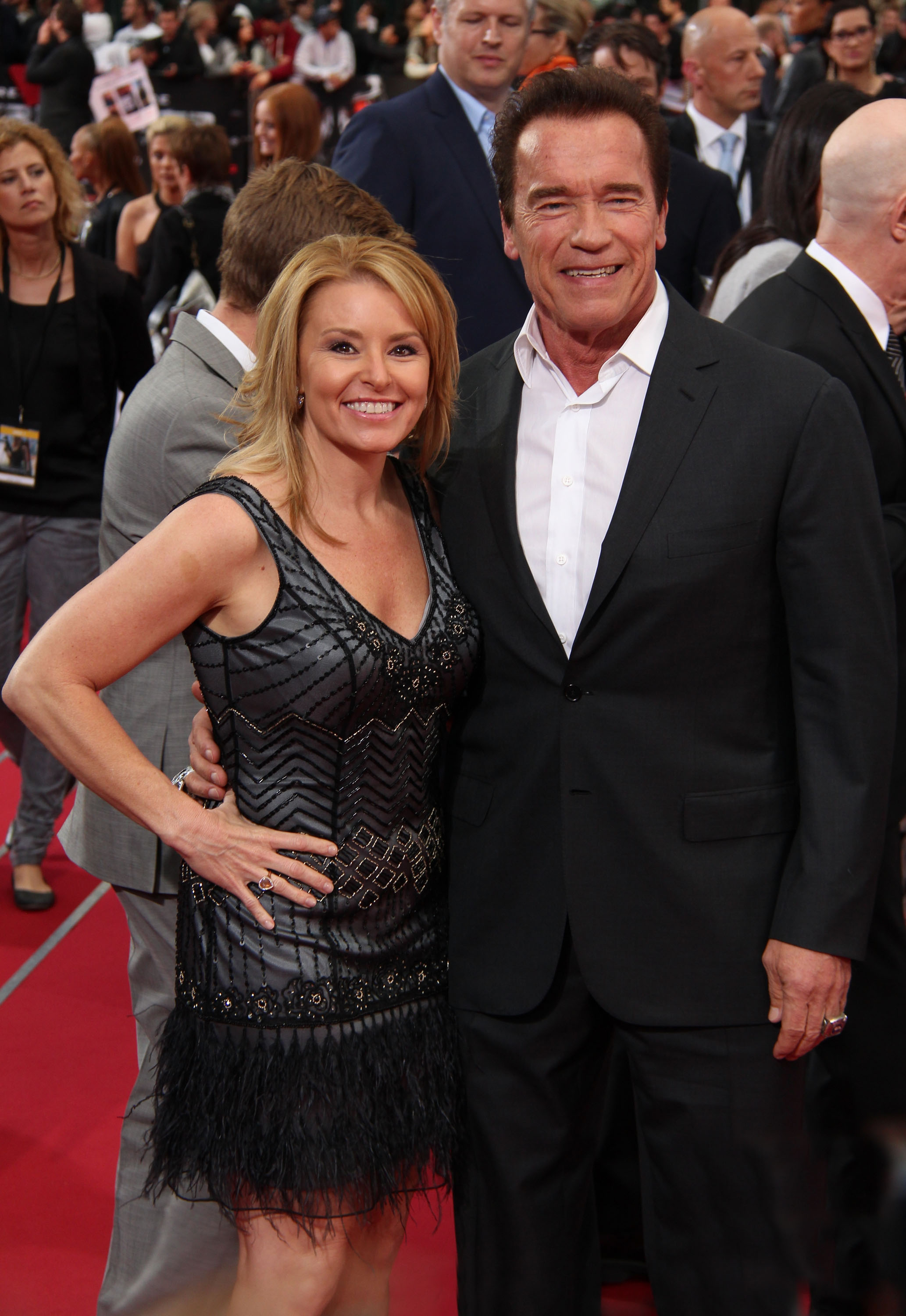 Arnold Schwarzenegger and girlfriend Heather Milligan attend the European Premiere of 'Terminator: Genisys' at the CineStar Sony Center on June 21, 2015 in Berlin, Germany | Source: Getty Images