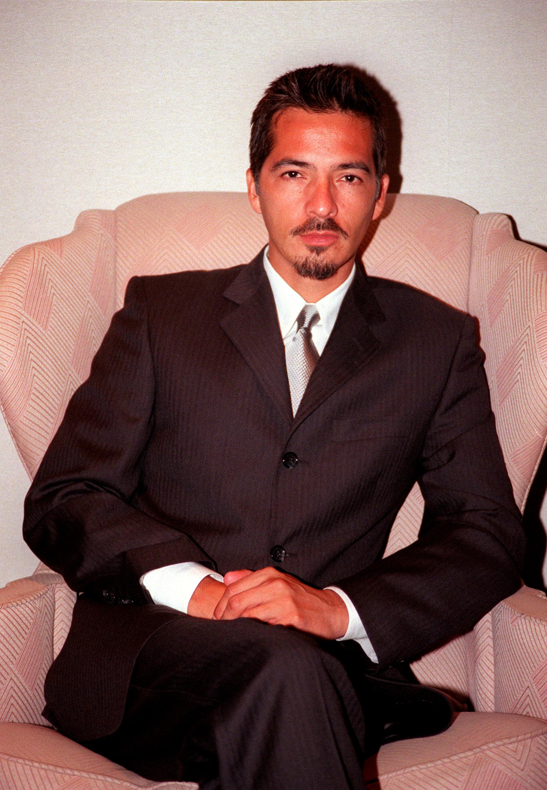 Rene Elizondo sits at his lawyer's office to announce his divorce from Janet Jackson May 31, 2000, in Century City, CA. | Source: Getty Images