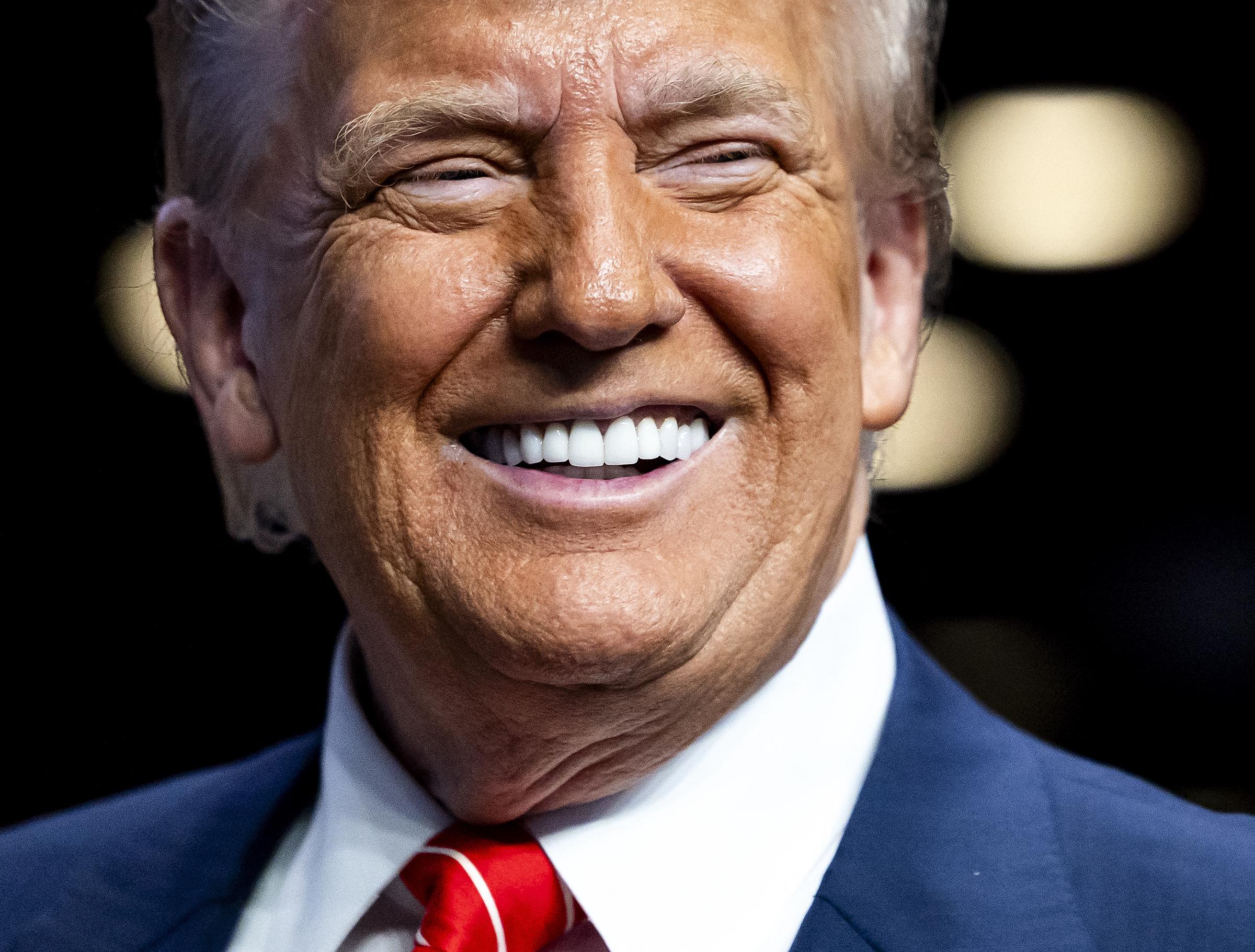 Trump is captured laughing during a plenary session, a rare lighthearted moment that reveals flashes of joy and calm amid the otherwise intense and high-stakes discussions. His relaxed expression offers a brief glimpse of levity in a room charged with global responsibility.