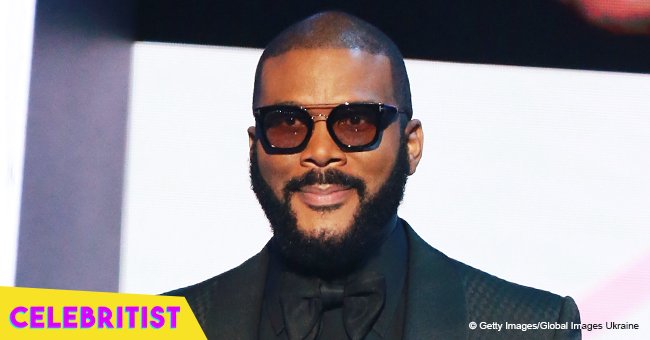 Tyler Perry's longtime partner shows off slender legs in denim mini skirt & black jacket in pic