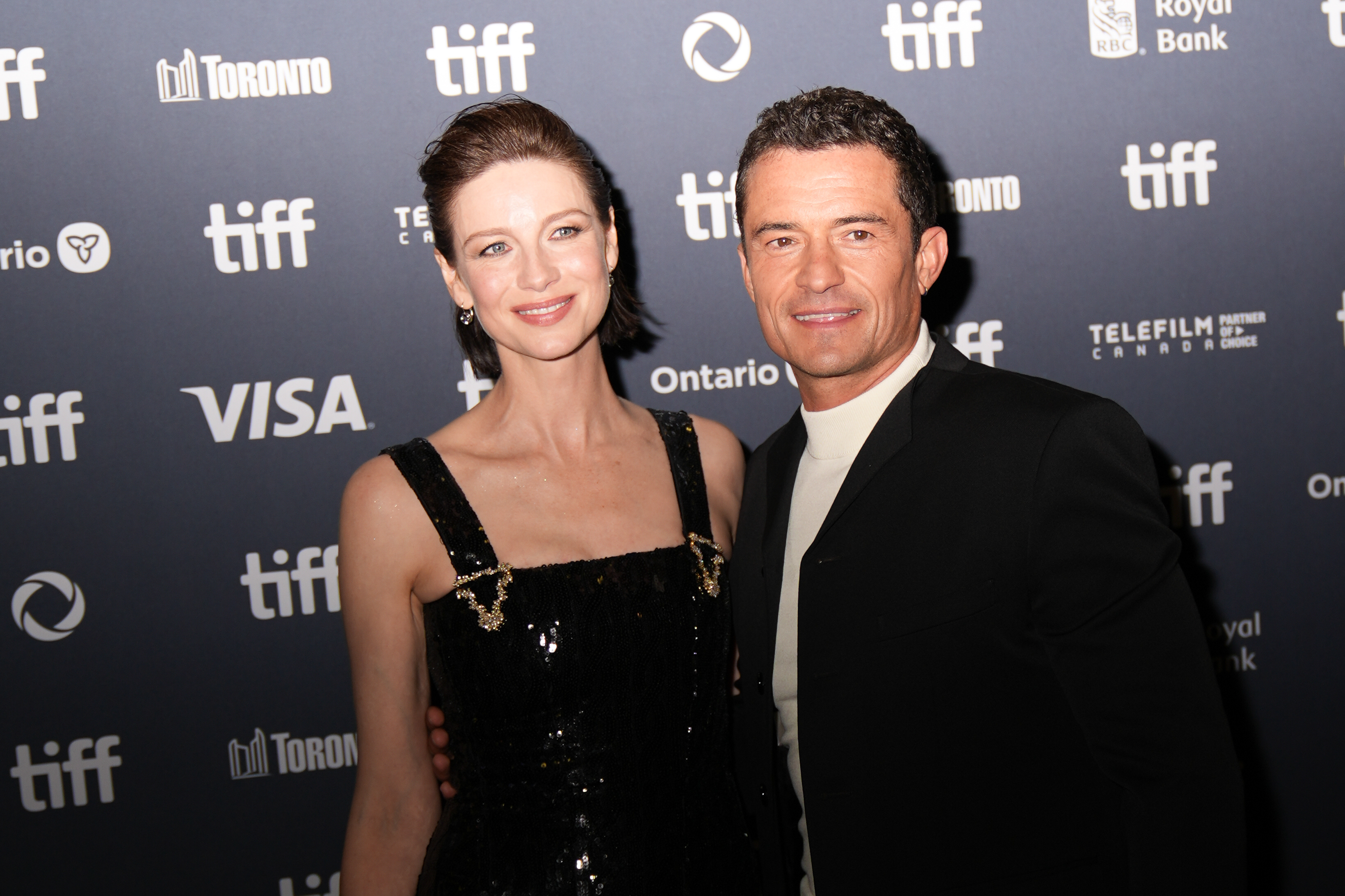 Caitriona Balfe and Orlando Bloom attend the premiere of "The Cut" during the Toronto International Film Festival on September 5, 2024 | Source: Getty Images
