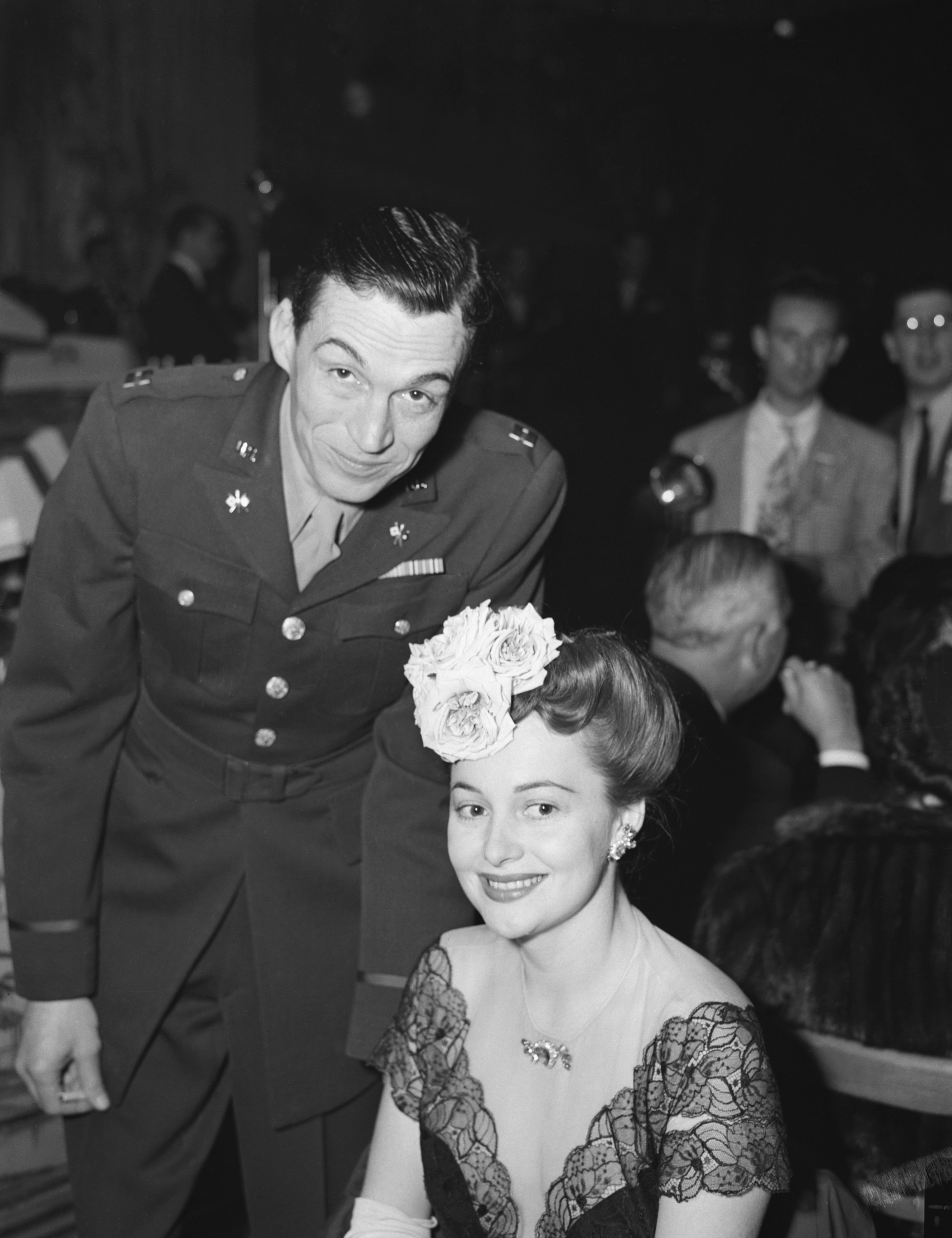 Captain John Huston, and actress Olivia De Havilland, attending the annual Academy of Motion Picture Arts Awards at the Cocoanot Grove | Source: Getty Images