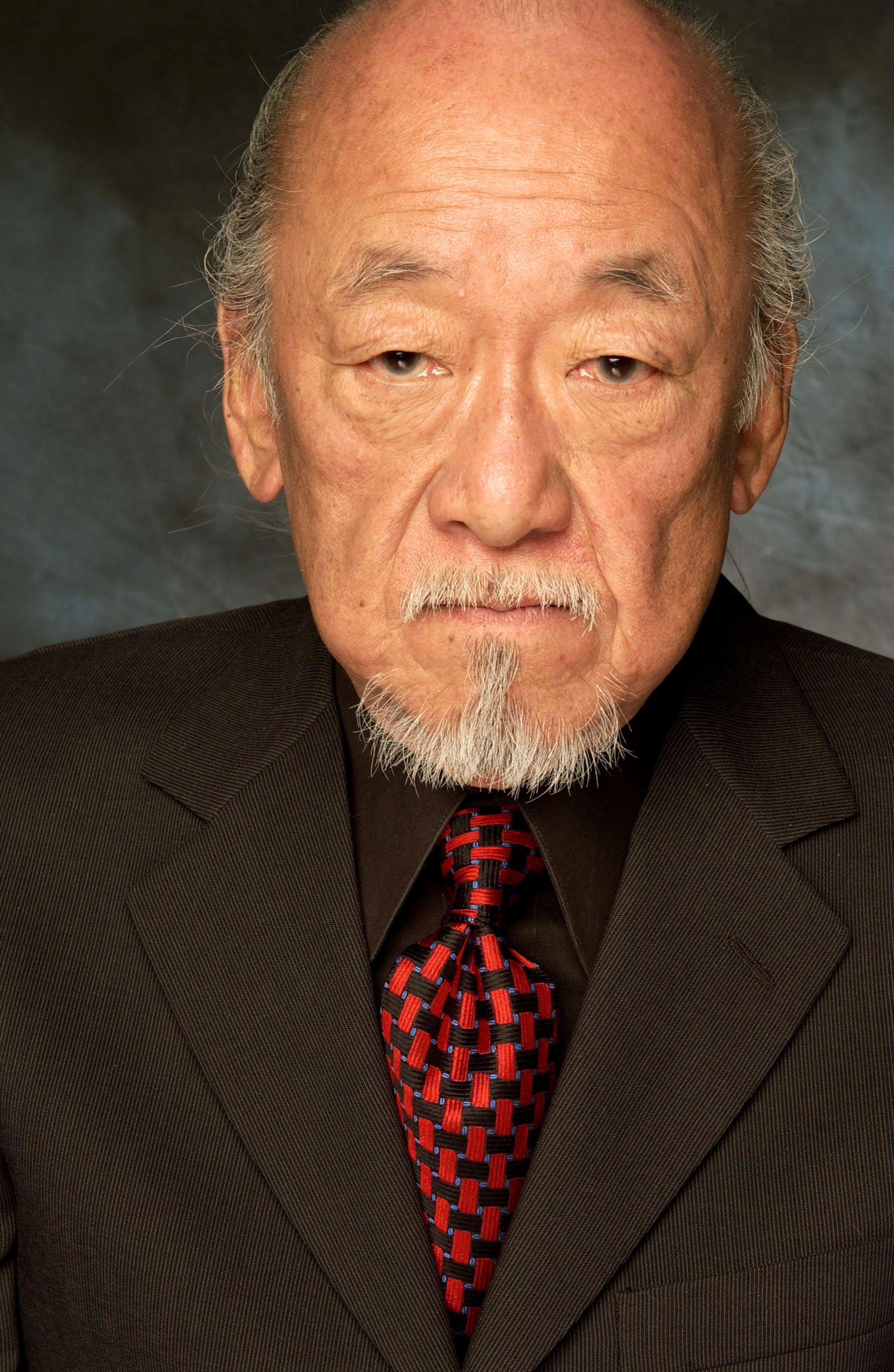Pat Morita during CineVegas Film Festival 2003 posing for "Stuey" portraits at Palms Hotel in Las Vegas, Nevada. | Source: Getty Images