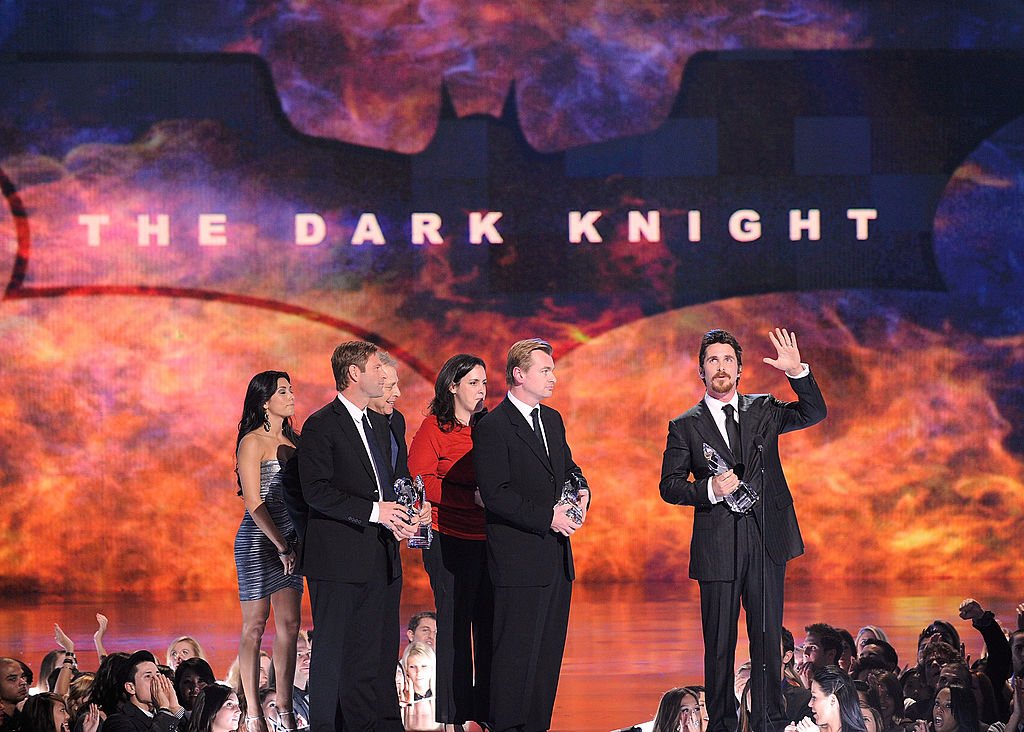  Actor Aaron Eckhart, producers, Director Christopher Nolan and actor Christian Bale accept multiple awards (Favorite On-Screen Match-Up, Action Movie, Cast and Superhero) for The Dark Knight during the 35th Annual People's Choice Awards held at the Shrine Auditorium on January 7, 2009 in Los Angeles, California | Photo: Getty Images