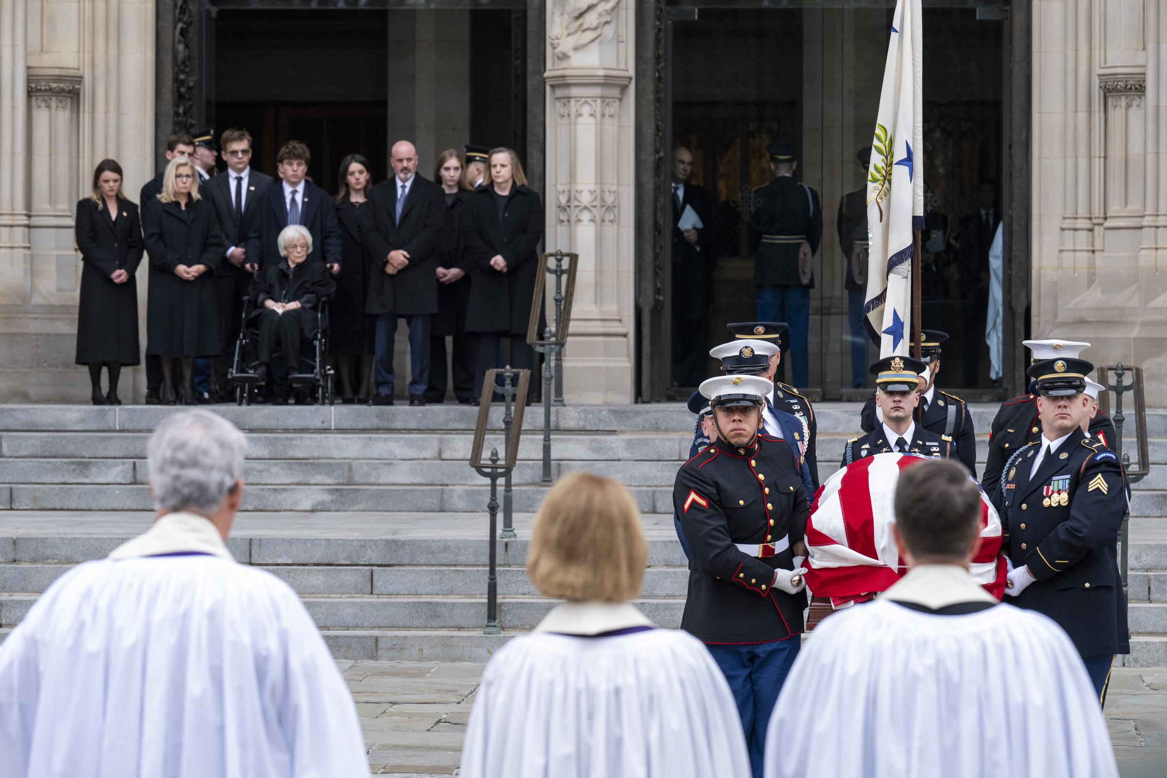 Family members of former Vice President Dick Cheney watch as his casket is carried out of the Washington National Cathedral on November 20, 2025 | Source: Getty Images