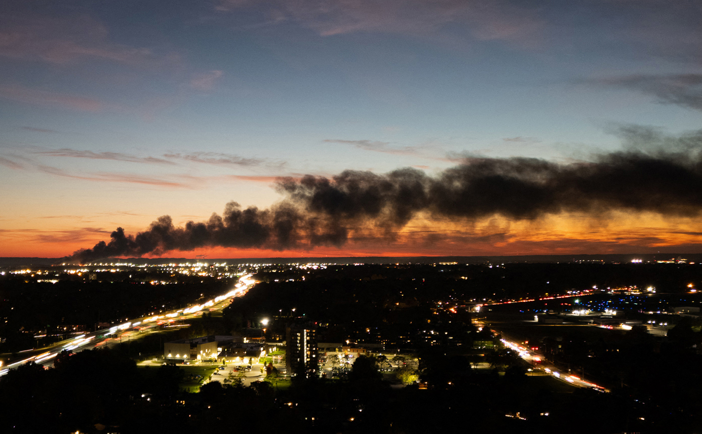 A view of smoke rising at the crash site of the UPS plane near Louisville Muhammad Ali International Airport in Louisville, Kentucky on November 4, 2025. | Source: Getty Images
