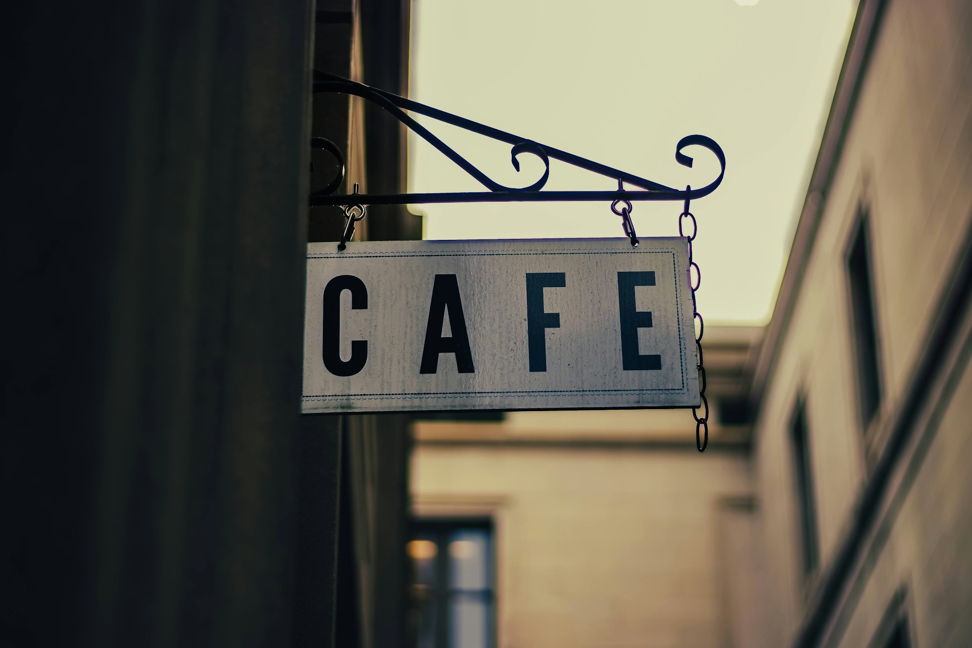 A sign hung outside an establishment | Source: Unsplash