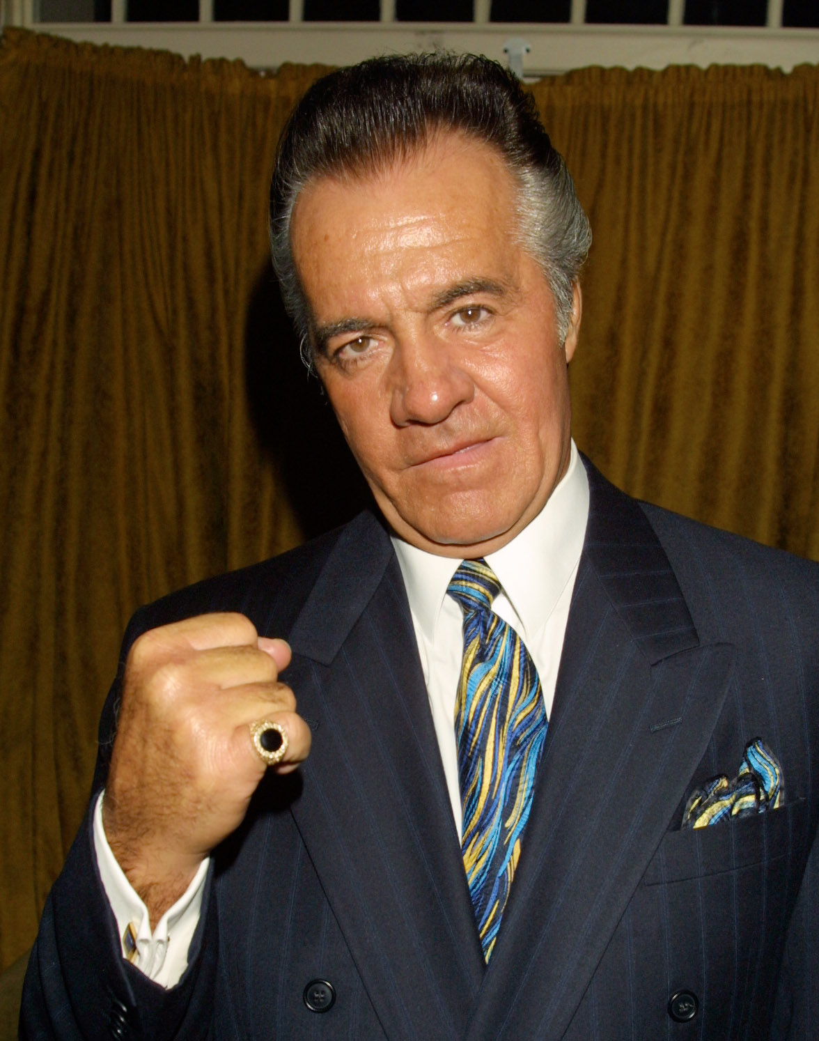Tony Sirico was connected to the criminal world in real life before pursuing his acting career. In this photo, he attended the Celebration of Rodgers & Hammerstein's "Cinderella" at One51 on May 4, 2001, in New York City, New York. | Source: Getty Images