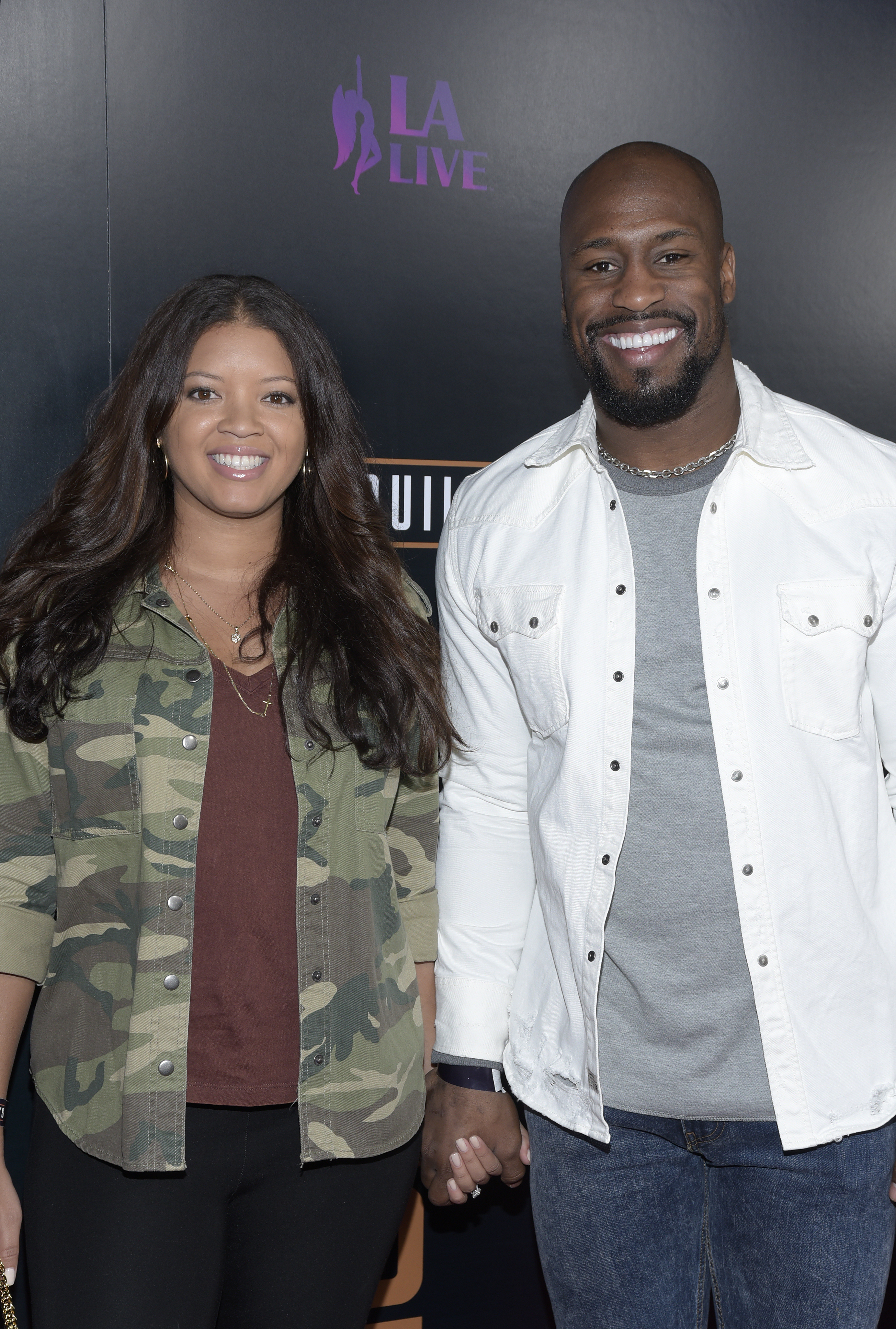 Kayla Sortor and Vernon Davis attend the grand opening of Shaquille's At L.A. Live on March 9, 2019, in Los Angeles, California. | Source: Getty Images
