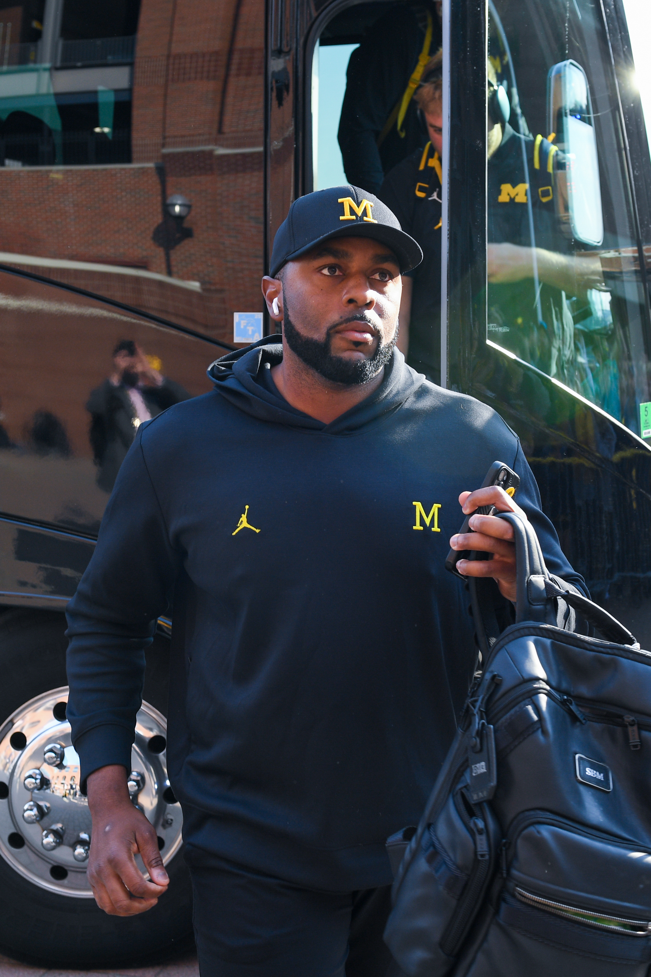 Sherrone Moore arrives before a college football game against the Washington Huskies on October 18, 2025 | Source: Getty Images