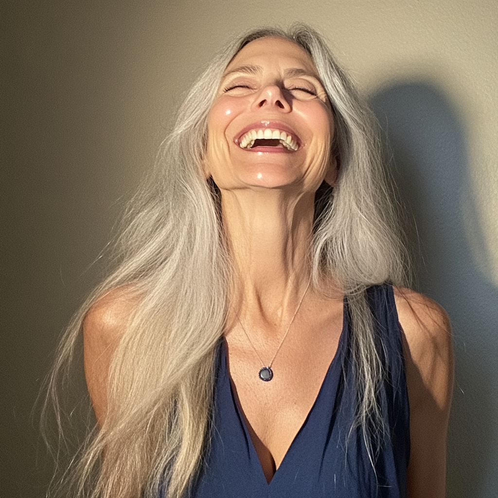 A laughing older woman | Source: Midjourney