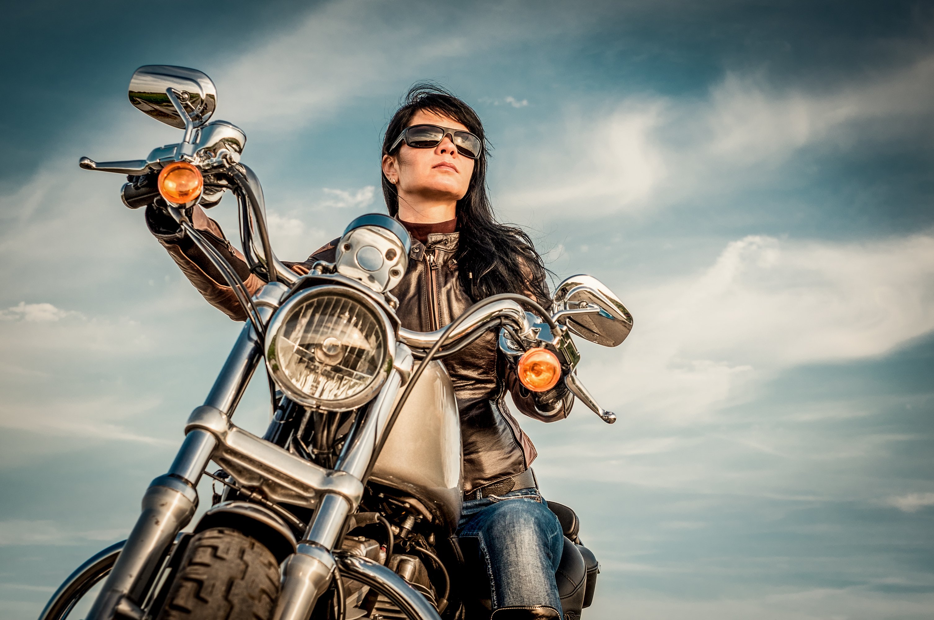 Woman on a motorcycle. Image credit: Shutterstock