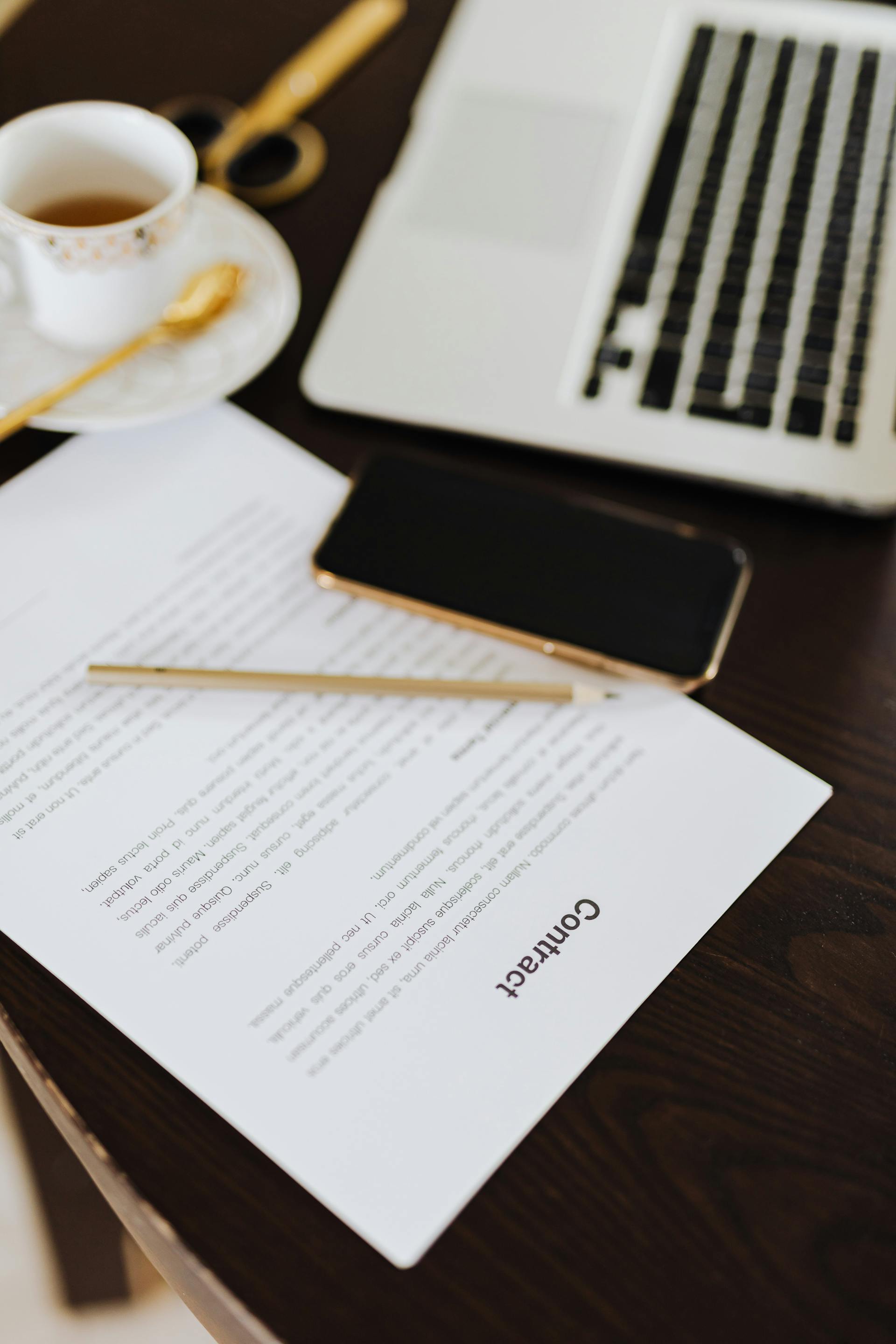 A contract paper lying on a table | Source: Pexels
