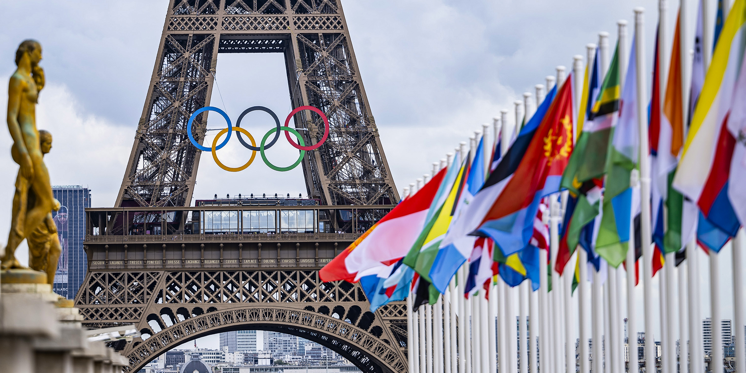 The Olympic Games emblem on the Eiffel Tower | Source: Getty Images