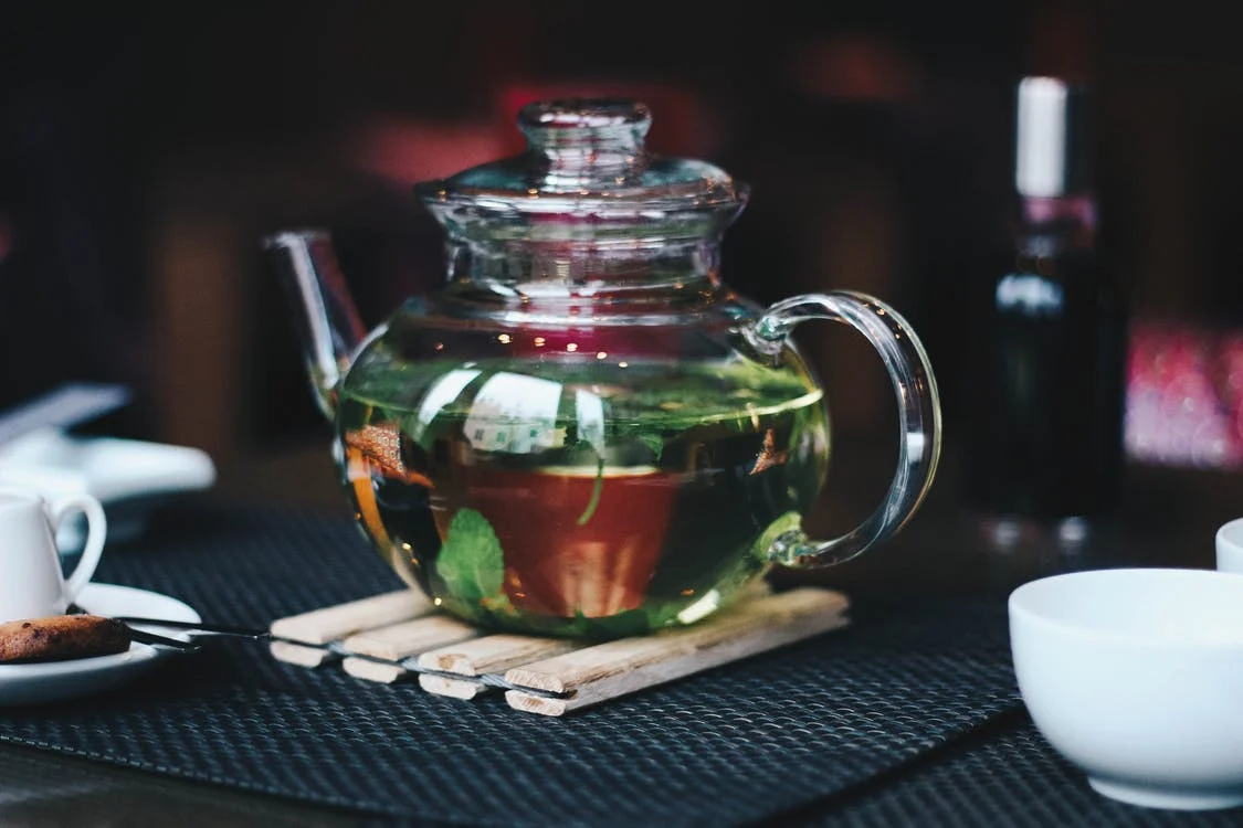 Lorena prepared tea and sat down with Gregory at the kitchen table. | Source: Pexels