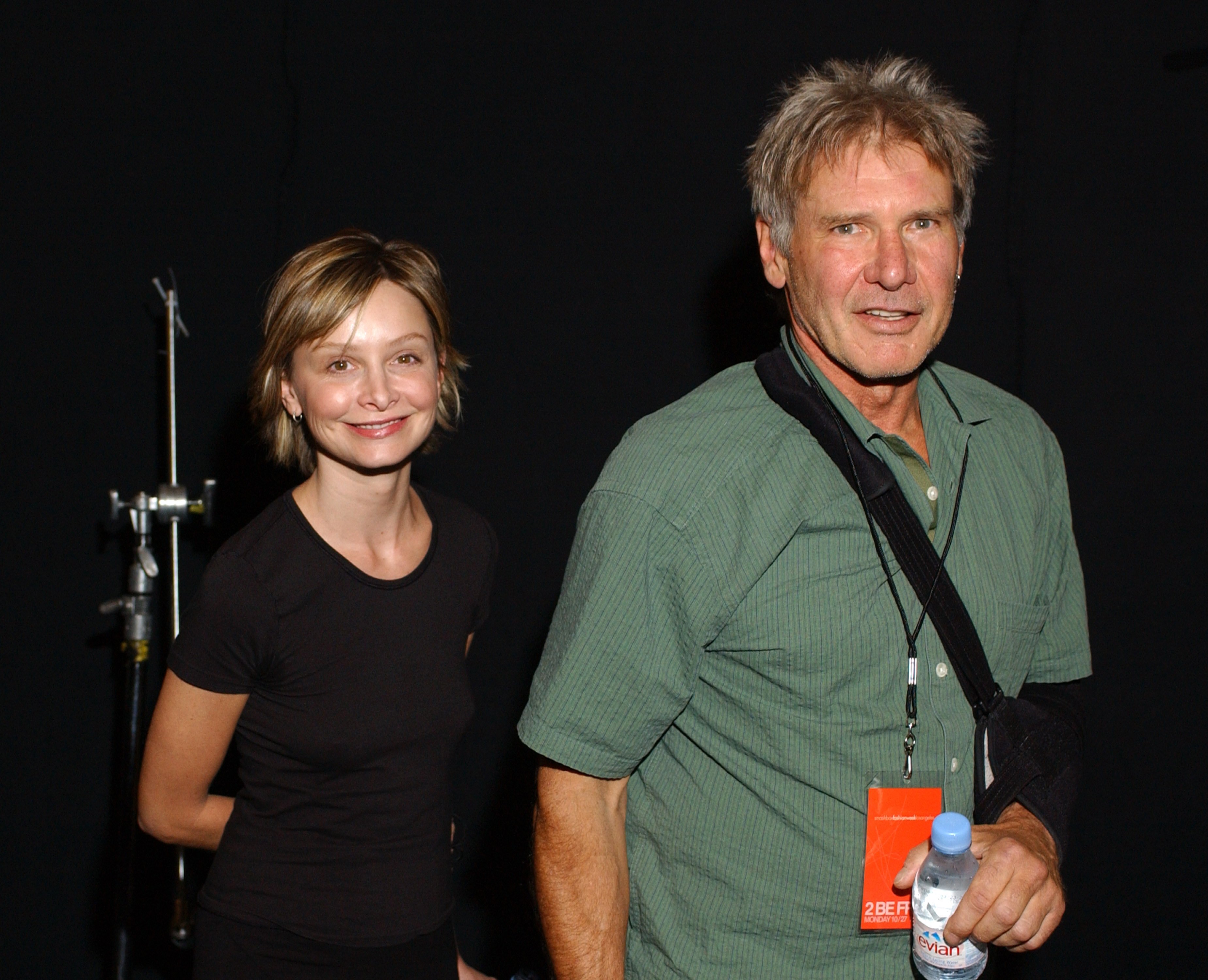 Calista Flockhart and Harrison Ford at the Smashbox LA Fashion Week Spring in Culver City, California, on October 27, 2003. | Source: Getty Images