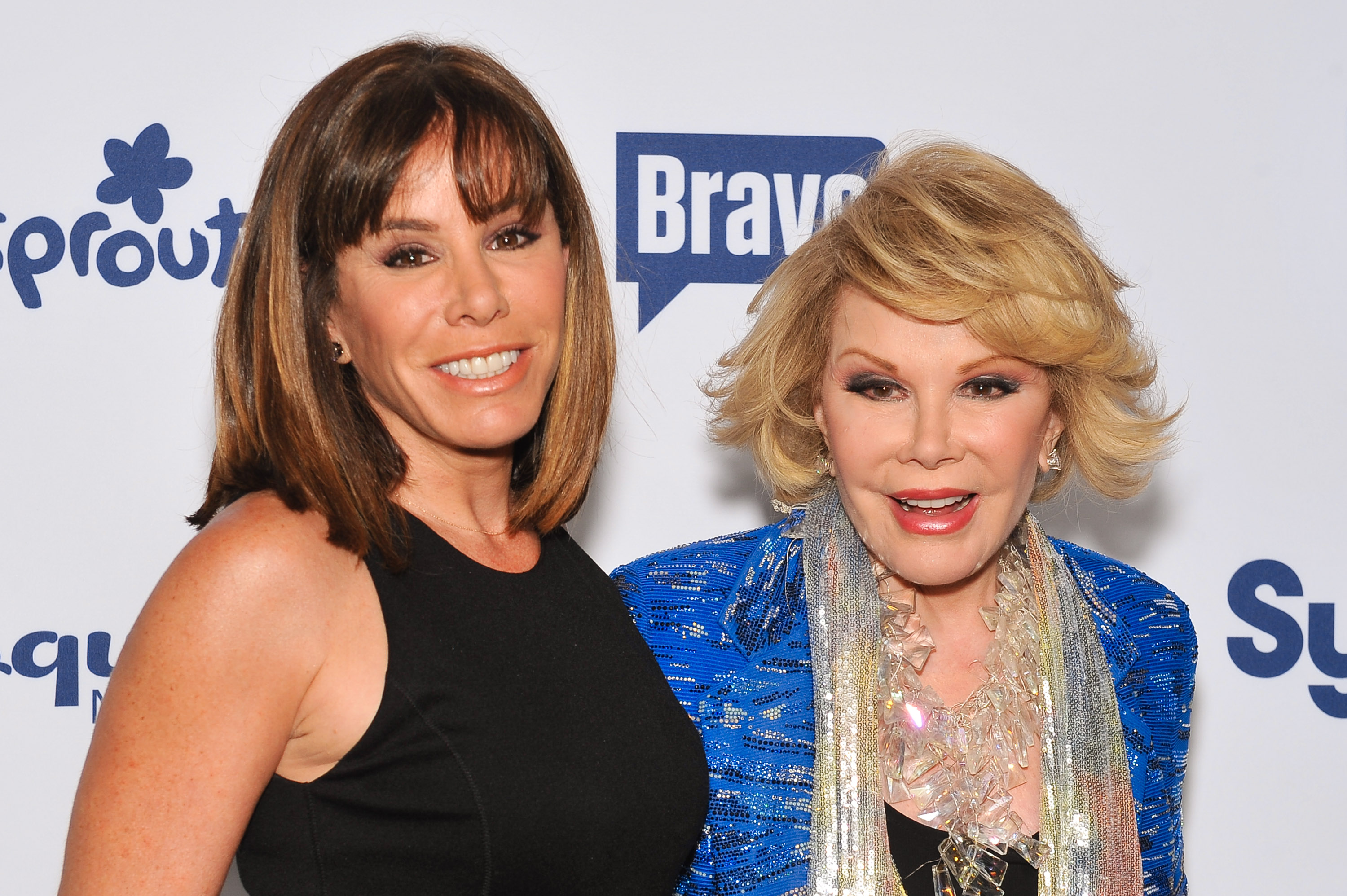 Joan Rivers (R) and daughter Melissa Rivers attend the 2014 NBCUniversal Cable Entertainment Upfronts at The Jacob K. Javits Convention Center on May 15, 2014, in New York City | Source: Getty Images