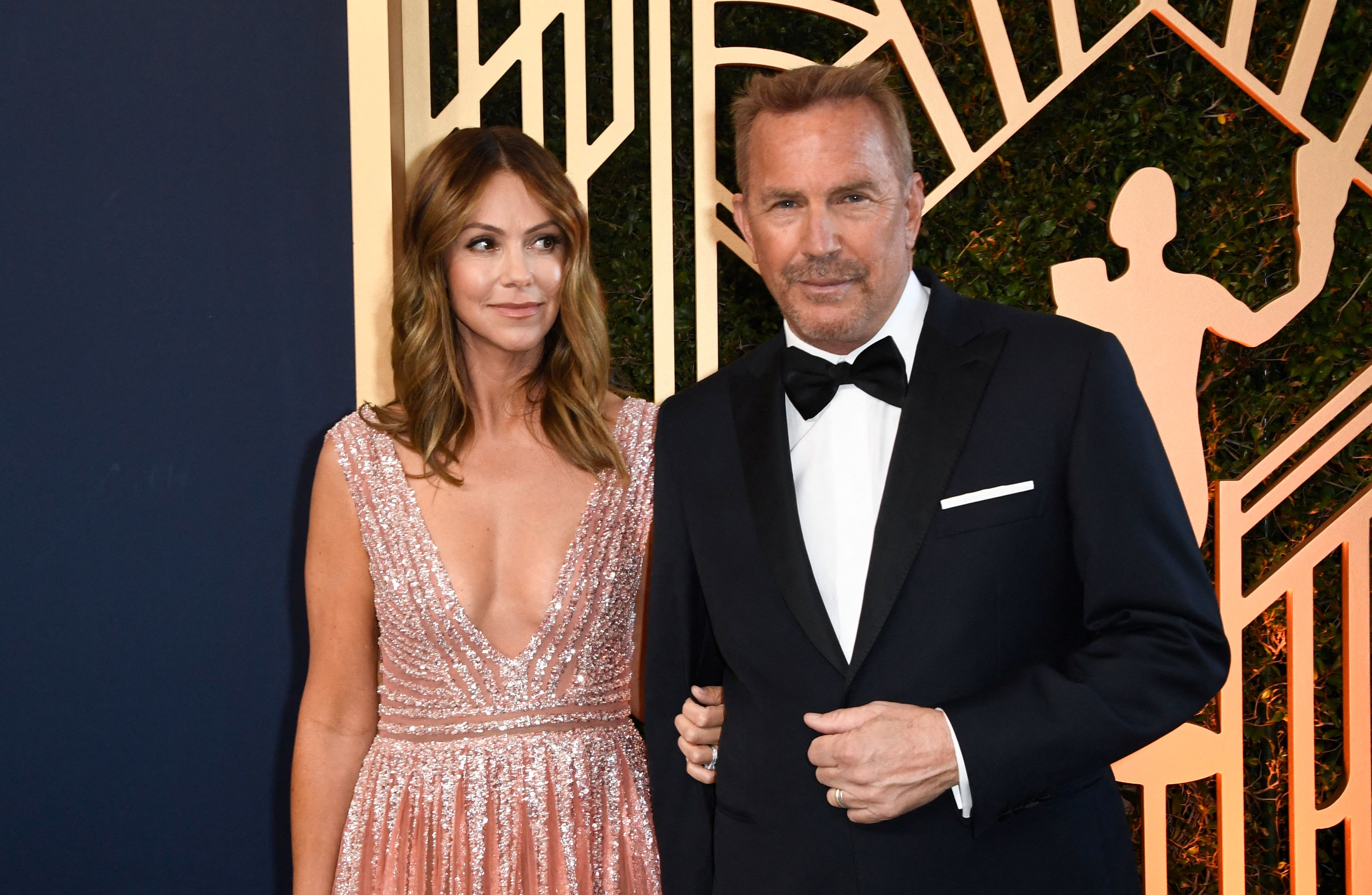 Kevin Costner and his wife, Christine at the 28th Annual Screen Actors Guild (SAG) Awards at the Barker Hangar in Santa Monica, California