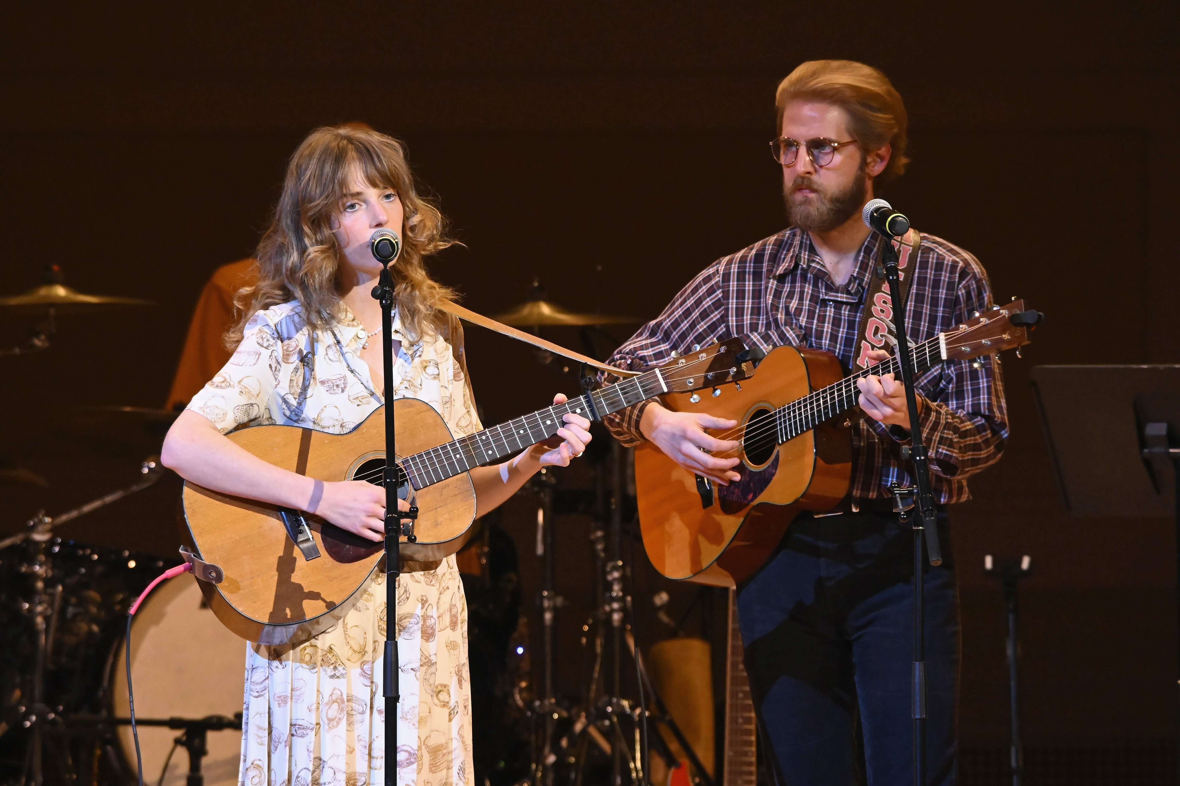 Maya Hawke and Christian Lee Hutson perform onstage during the 37th Annual Tibet House US Benefit Concert at Carnegie Hall on February 26, 2024 in New York City. | Source: Getty Images