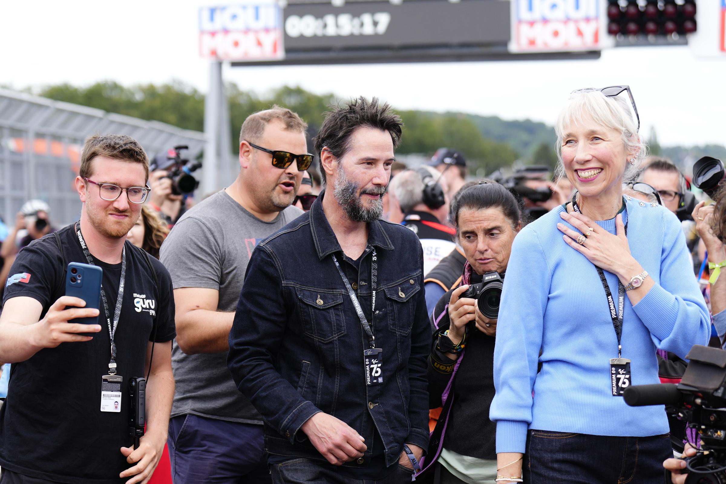 Keanu Reeves and Alexandra Grant arrive at the Liqui Moly Motorrad Grand Prix Deutschland at Sachsenring Circuit in Hohenstein-Ernstthal, Germany on July 7, 2024. | Source: Getty Images