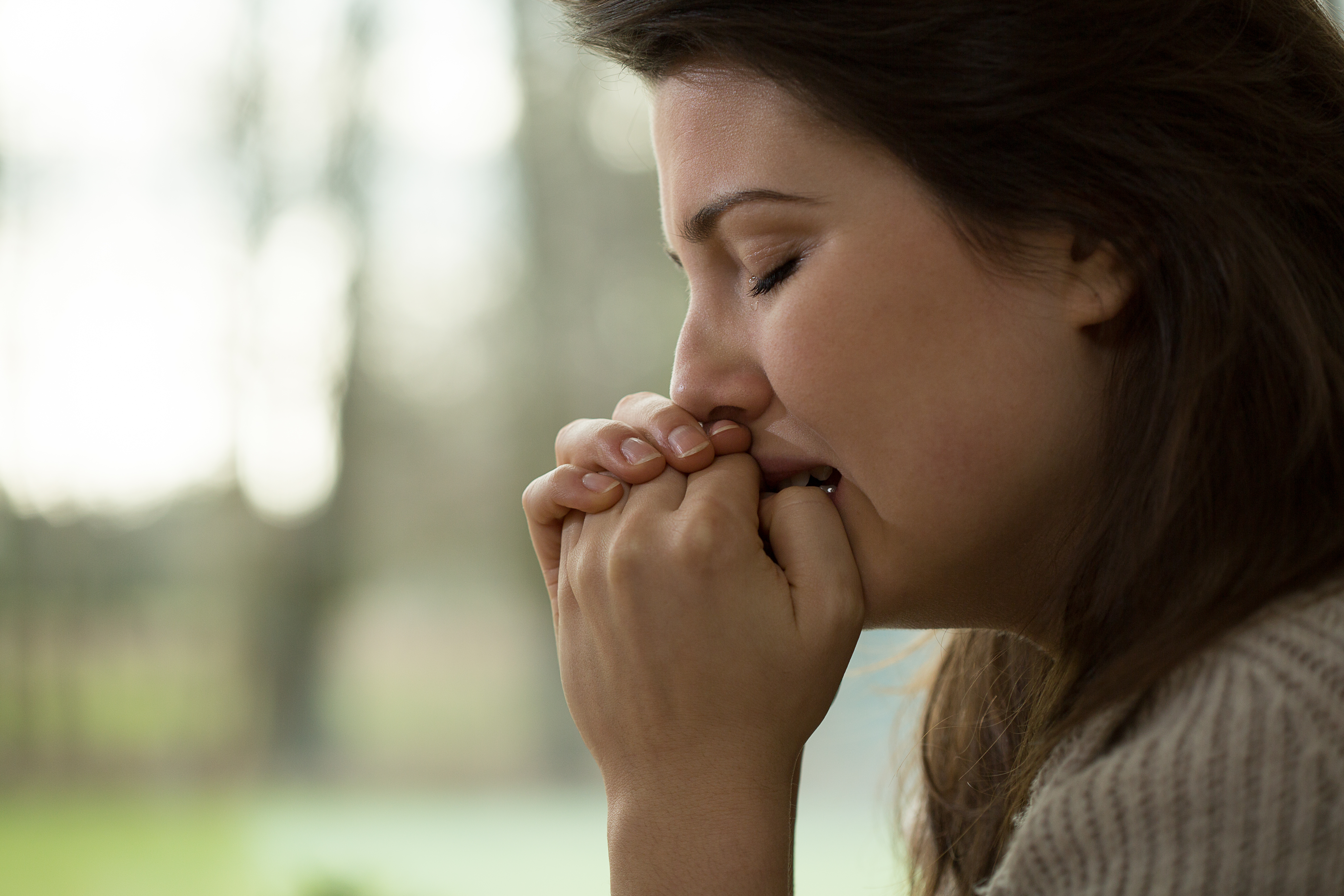 Crying young women with a nervous breakdown | Source: Shutterstock.com