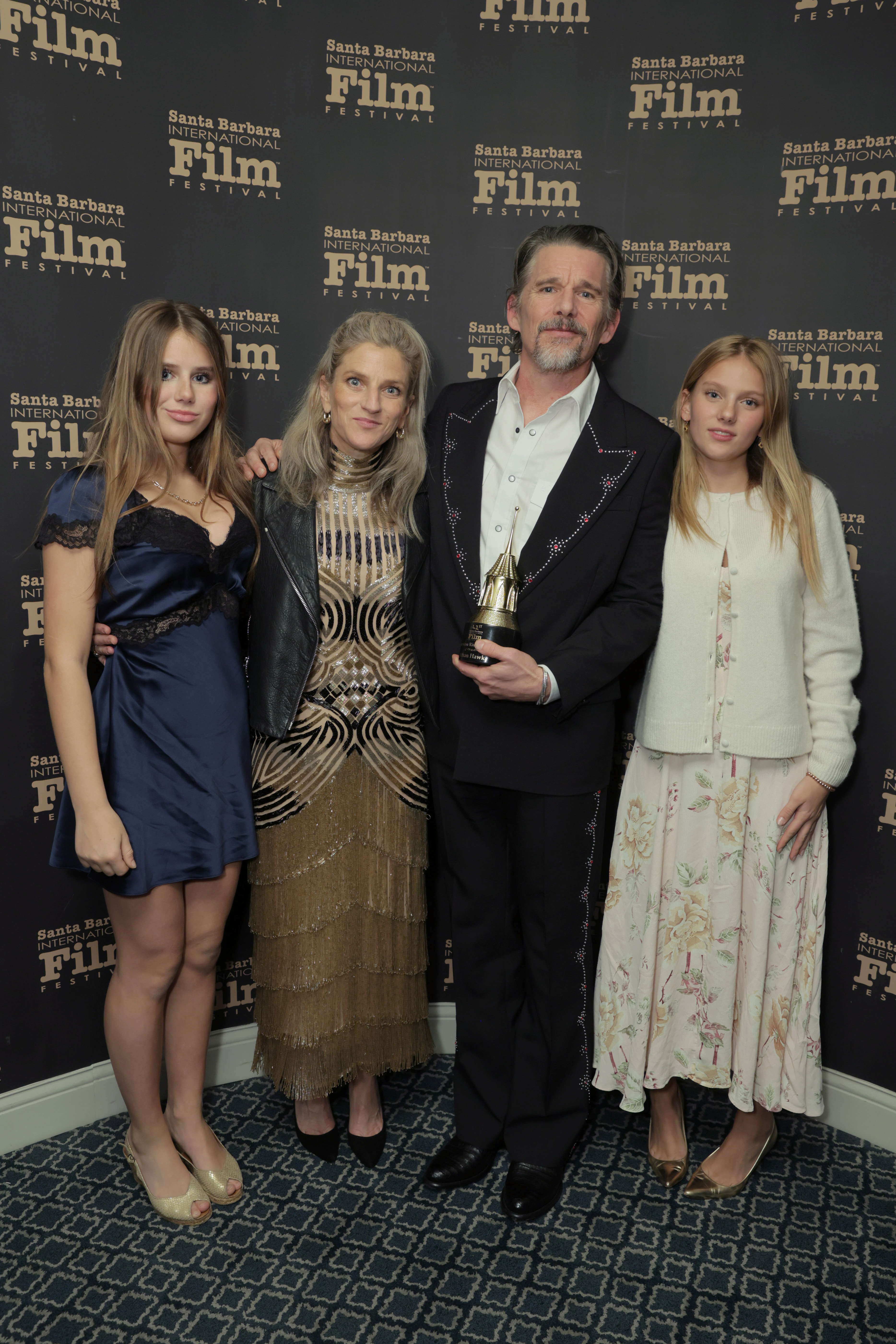 Indiana, Ryan, Ethan, and Clementine Hawke attended the American Riviera Award Tribute during the 41st Santa Barbara International Film Festival on February 6, 2026, in California, United States, posing together against the festival backdrop as Ethan held his award at centre stage — a polished and celebratory red carpet moment for the close-knit family.