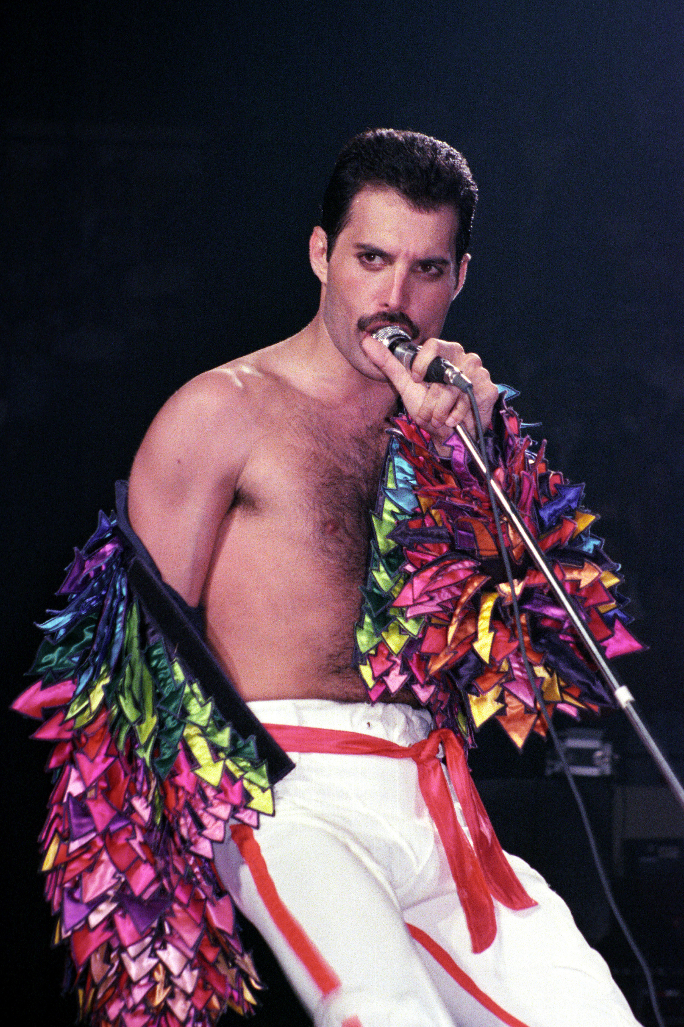 Freddie Mercury of Queen performs at Madison Square Garden on 27 July 1983 in New York City. | Source: Getty Images
