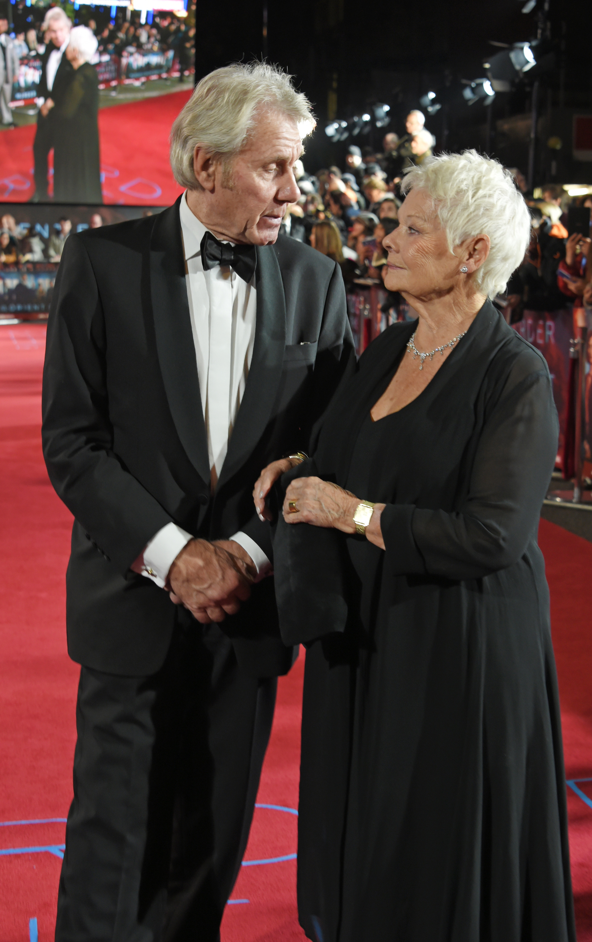 David Mills and Dame Judi Dench at the "Murder on the Orient Express" world premiere in London, 2017 | Source: Getty Images