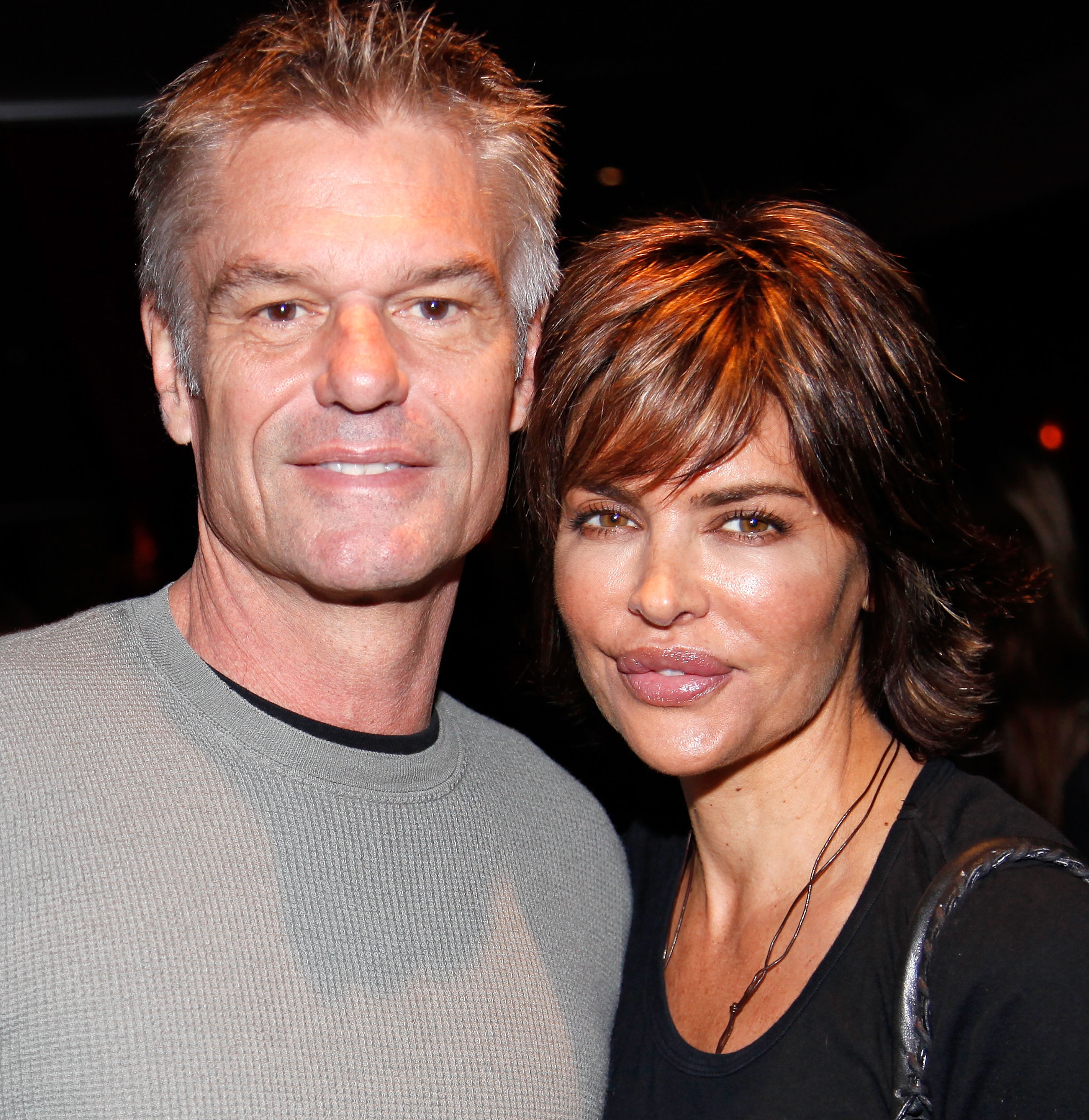 Harry Hamlin and Lisa Rinna attend Best Buddies International's "Bowling for Buddies" benefit at Lucky Strike Lanes at L.A. Live on February 21, 2010, in Los Angeles, California.