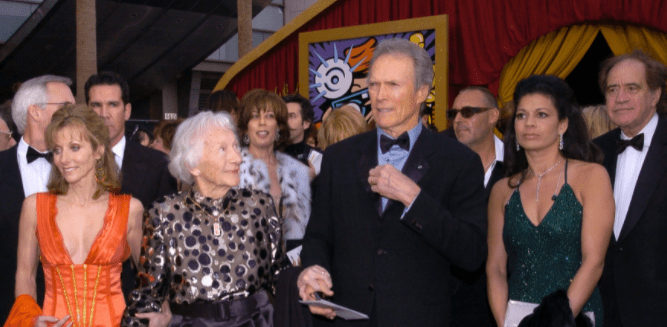 An undated image of Clint Eastwood (C) and his daughter Laurie Murray (L), mother Ruth Wood, and wife Dina Eastwood (R) during The 76th Annual Academy Awards at The Kodak Theater on February 29, 2004 in Hollywood, California | Photo: Getty Images