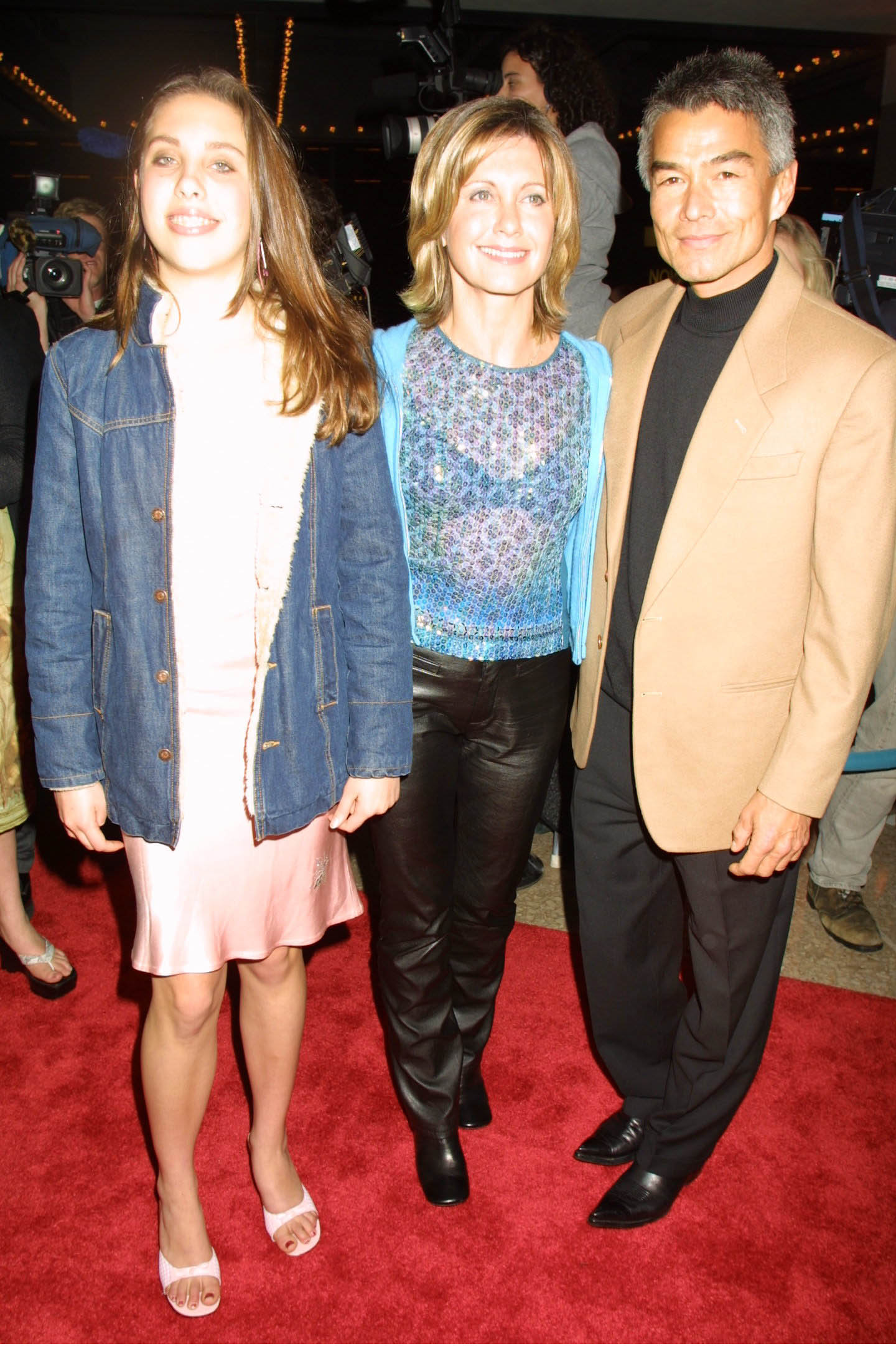 Chloe Lattanzi, Olivia Newton-John, and Patrick Kim McDermott at the "Mamma Mia!" New York opening night on February 26, 2001. | Source: Getty Images