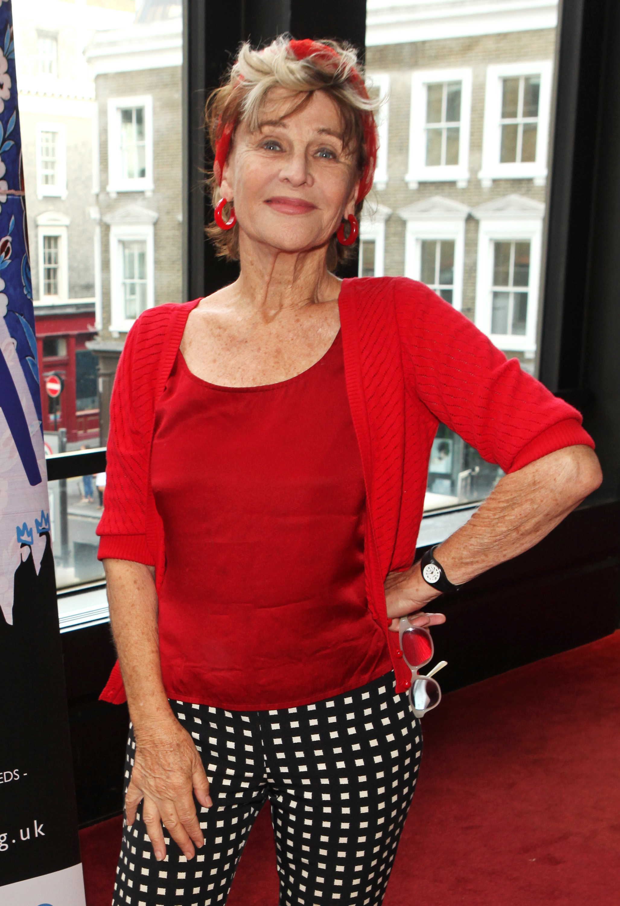 Christie attends the West End gala performance of "Queens of Syria" at the New London Theatre on Drury Lane, London, on 24 July 2016. Dressed in a vibrant red top with matching accessories, Christie shows her support for the powerful production — a modern adaptation of Euripides’ anti-war tragedy "The Trojan Women" performed by an all-female cast of Syrian refugees.