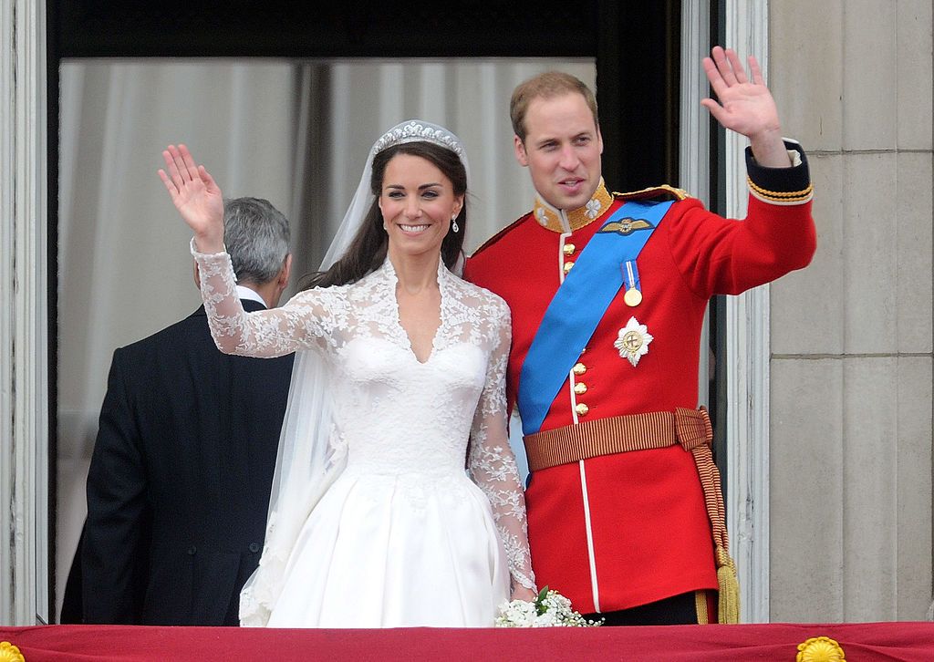 Kate Middleton, Duchess of Cambridge and Prince William, Duke of Cambridge, standing on the balcony of Buckingham Palace after getting married in London, England | Photo: Anwar Hussein/WireImage