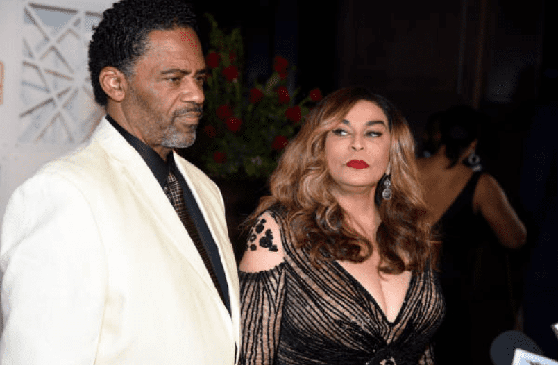 Tina Knowles stares at Richard Lawson as they arrived at "The Trifecta Gala" on May 4, 2018, in Louisville, Kentucky | Source: Stephen J. Cohen/Getty Images